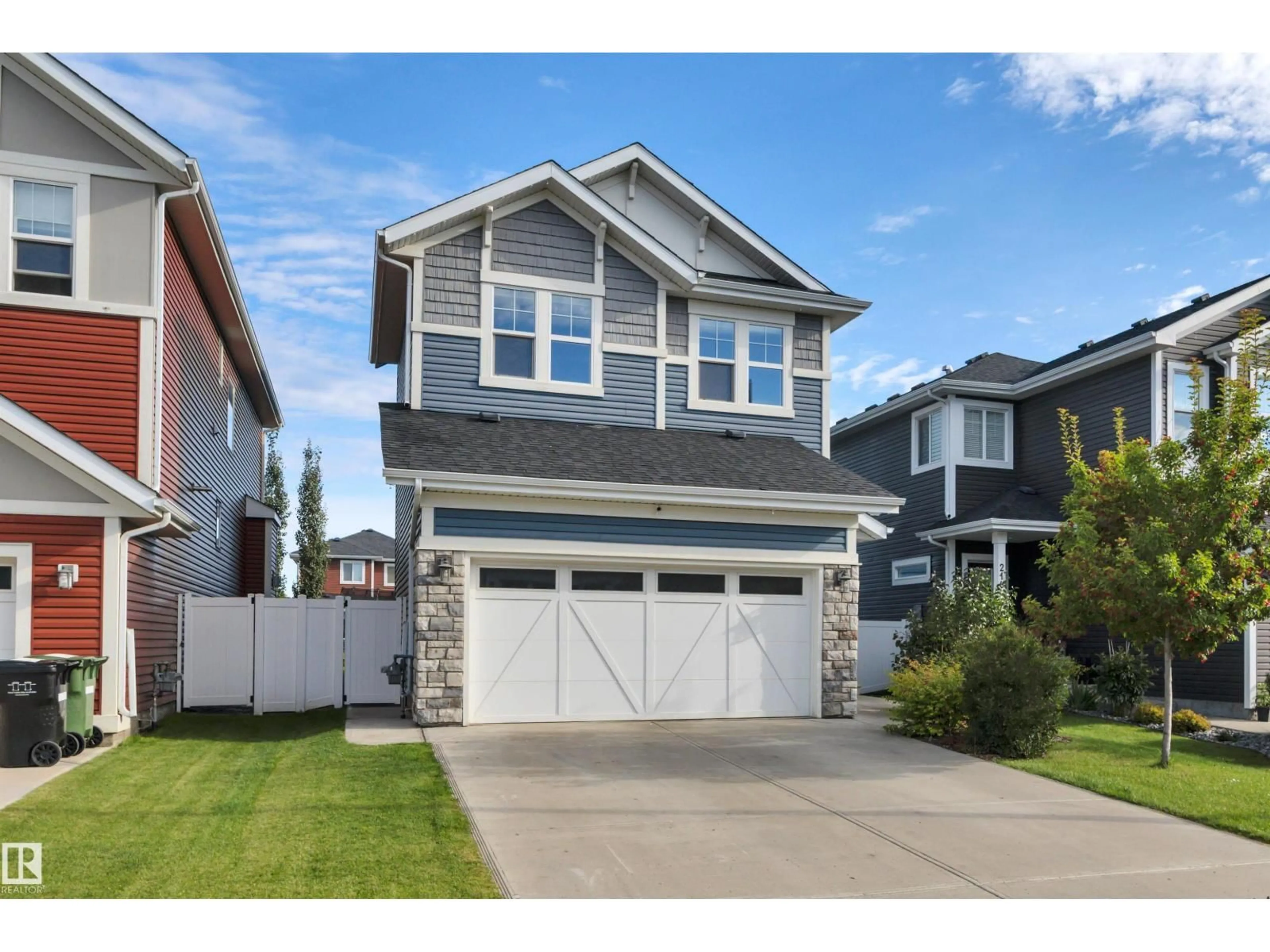 Home with vinyl exterior material, street for 220 SIMPKINS BN, Leduc Alberta T9E1B3
