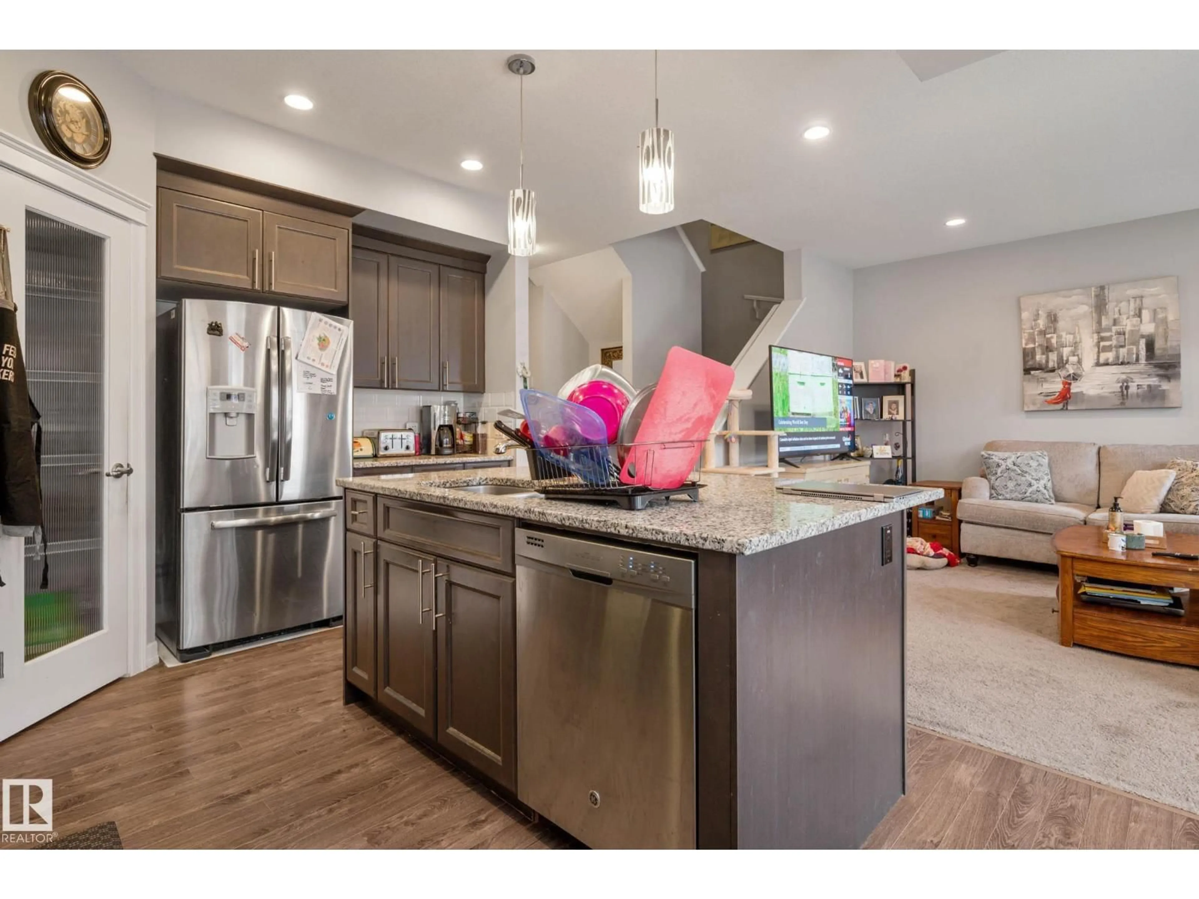 Open concept kitchen, wood/laminate floor for 424 SIMPKINS LI, Leduc Alberta T9E1B3