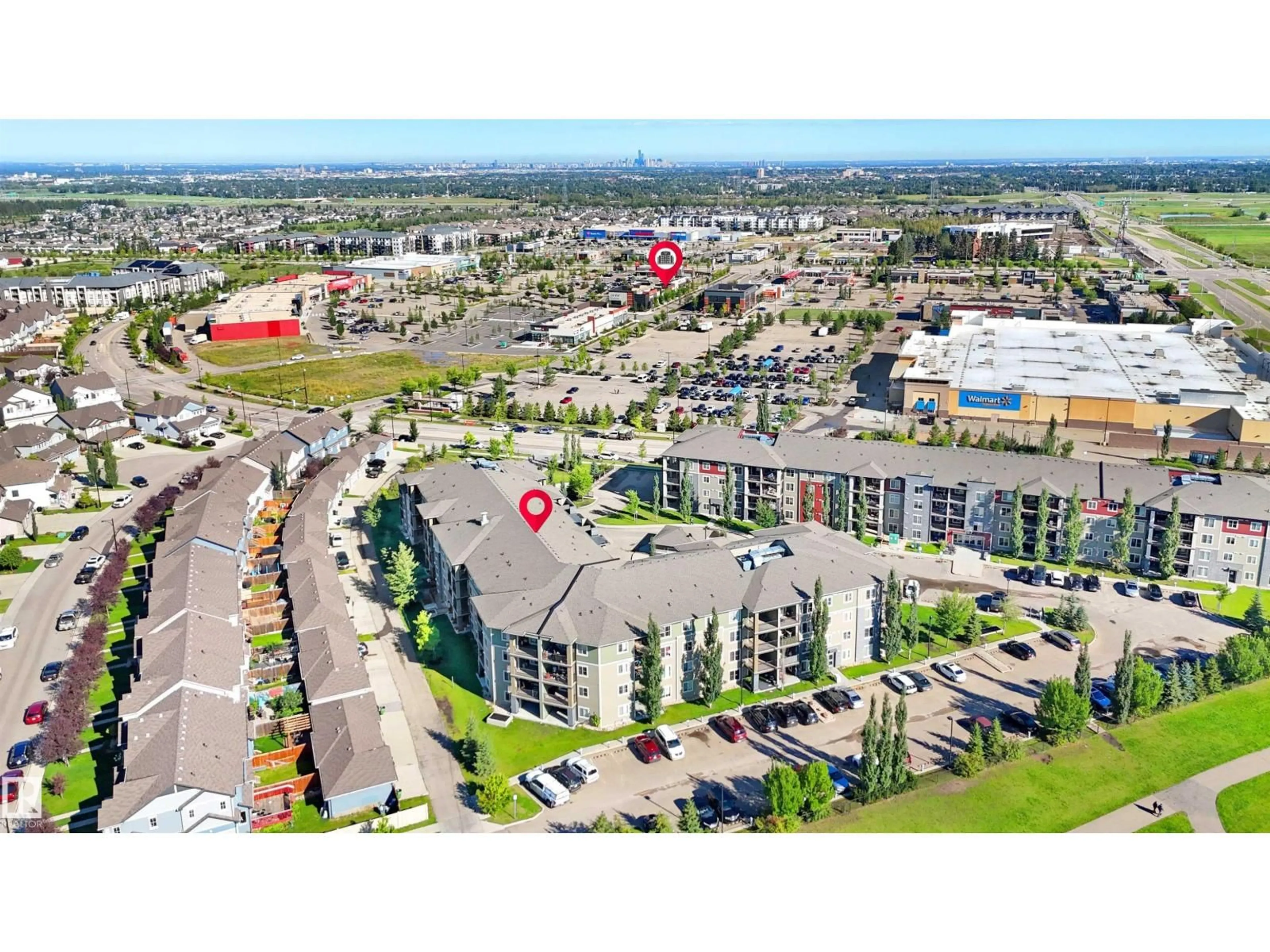A pic from outside/outdoor area/front of a property/back of a property/a pic from drone, street for #417 - 111 WATT CM, Edmonton Alberta T6X2C6