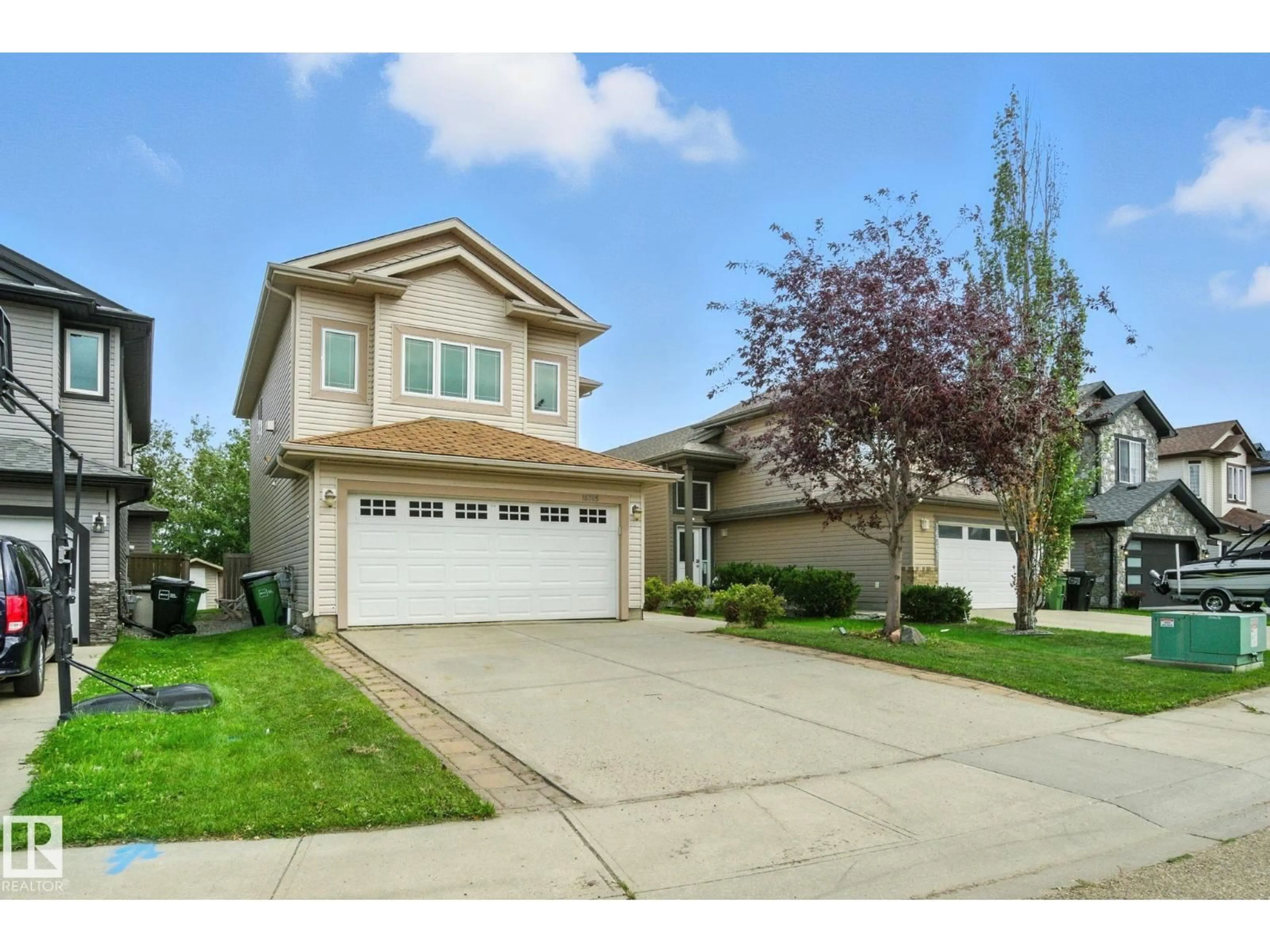 Home with vinyl exterior material, street for 16765 112A ST, Edmonton Alberta T5X6J6
