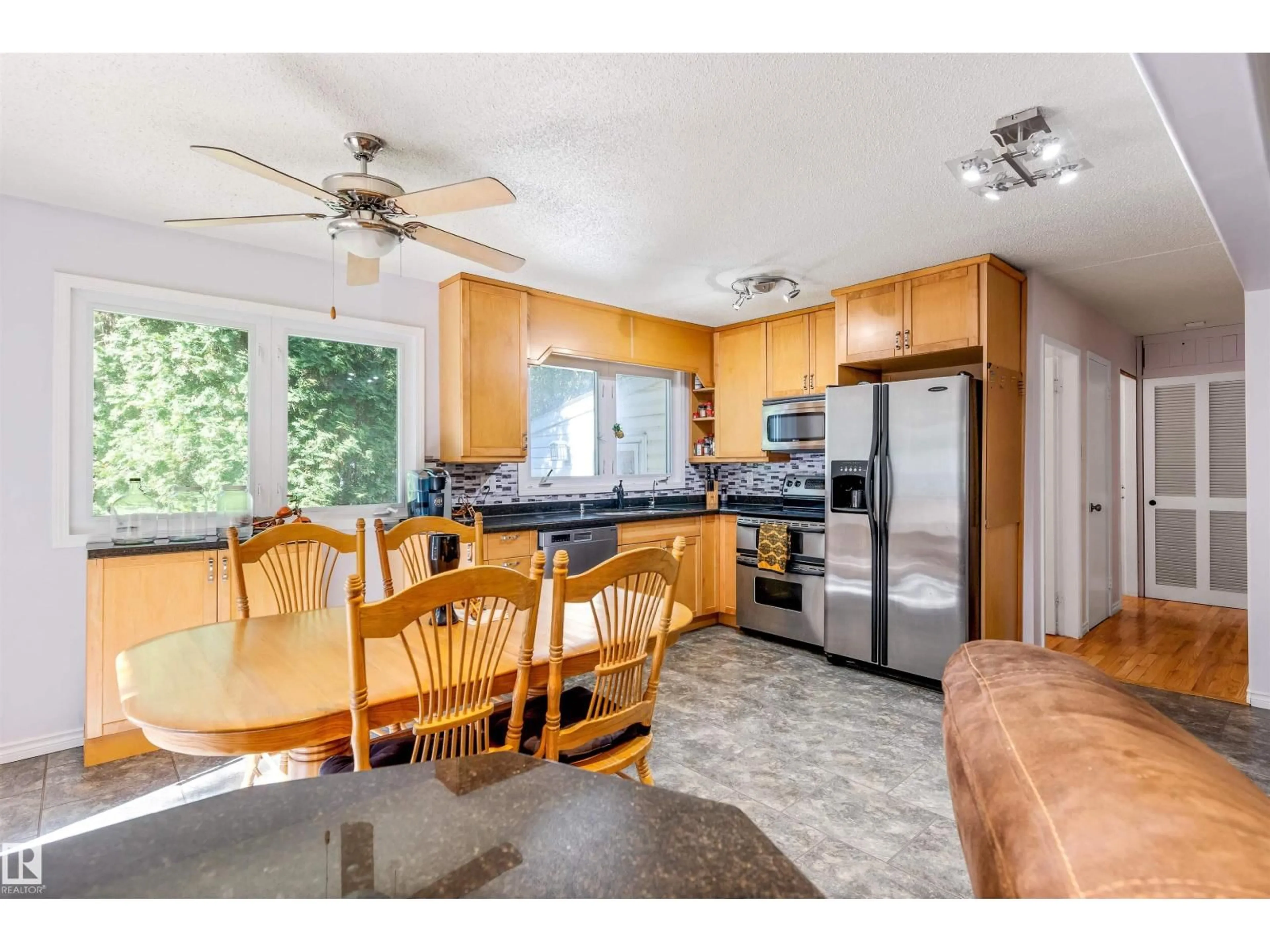 Open concept kitchen, wood/laminate floor for 1700 LAKESIDE DR, Rural Parkland County Alberta T7Z2V9