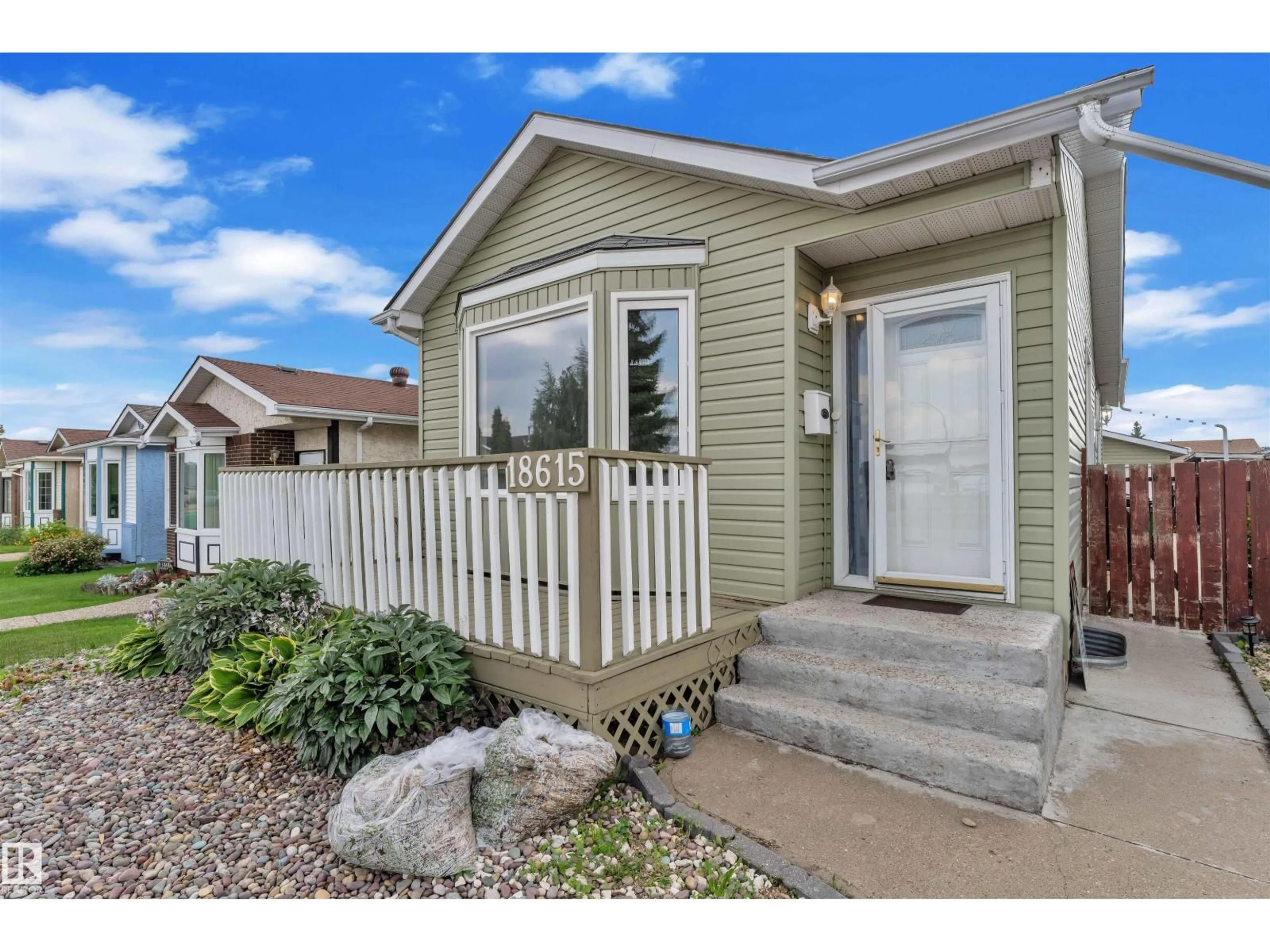 Home with vinyl exterior material, street for 18615 75 AV, Edmonton Alberta T5T5J9
