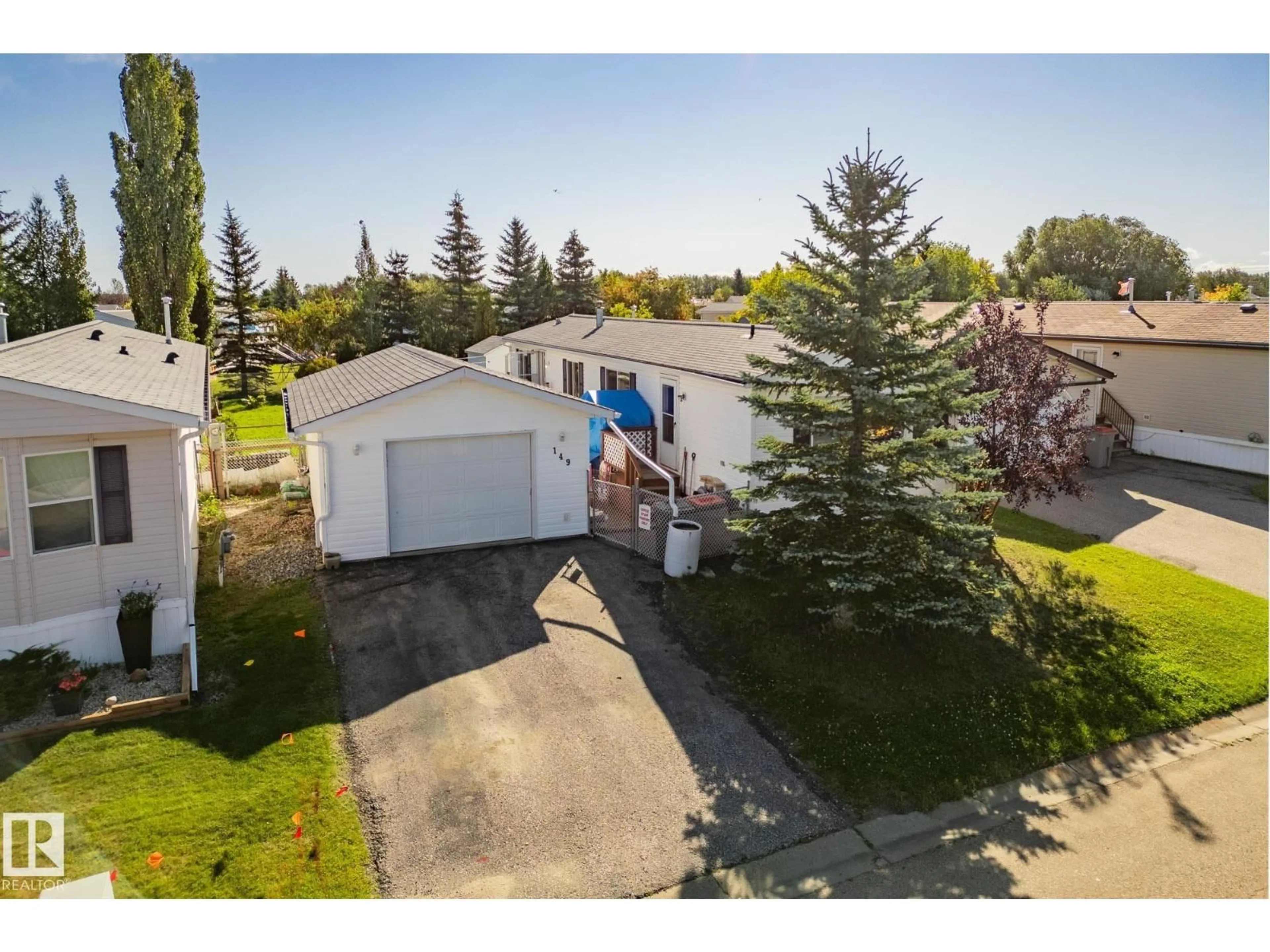 A pic from outside/outdoor area/front of a property/back of a property/a pic from drone, street for 149 3400 48 ST, Stony Plain Alberta T7Z1V9