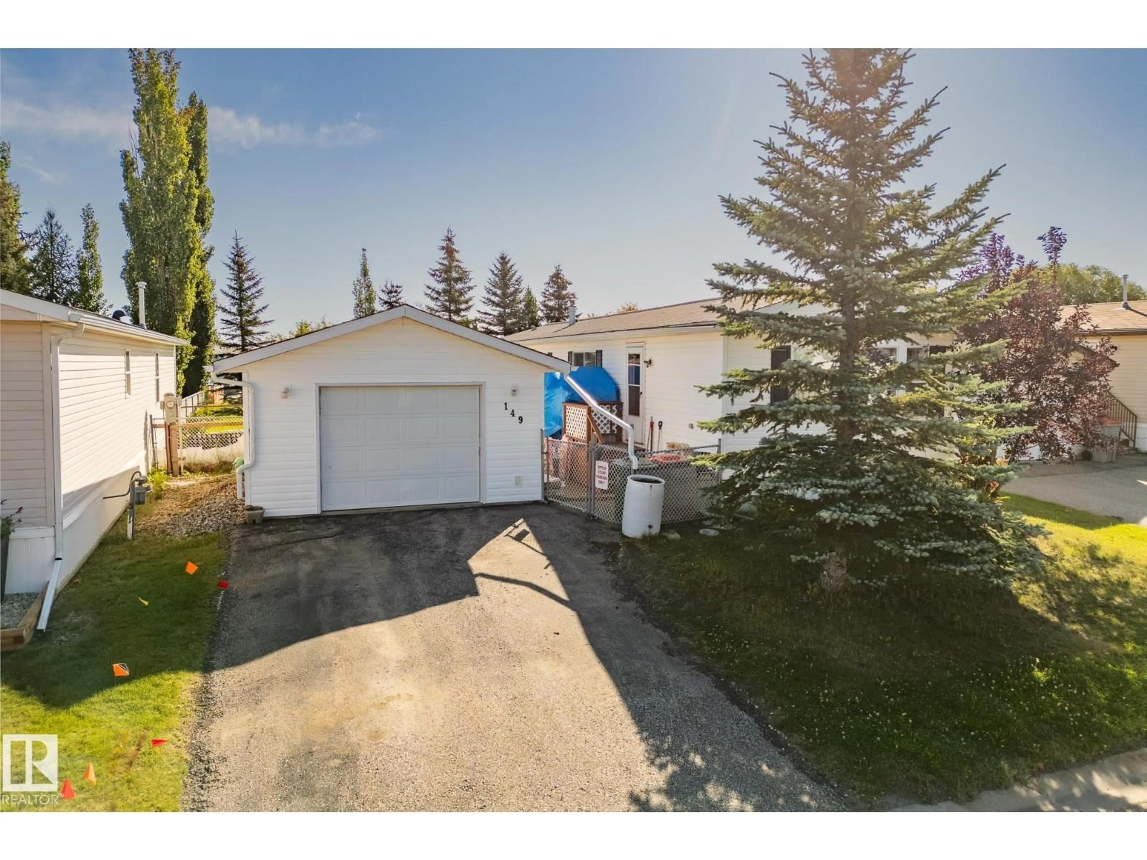 A pic from outside/outdoor area/front of a property/back of a property/a pic from drone, street for 149 3400 48 ST, Stony Plain Alberta T7Z1V9