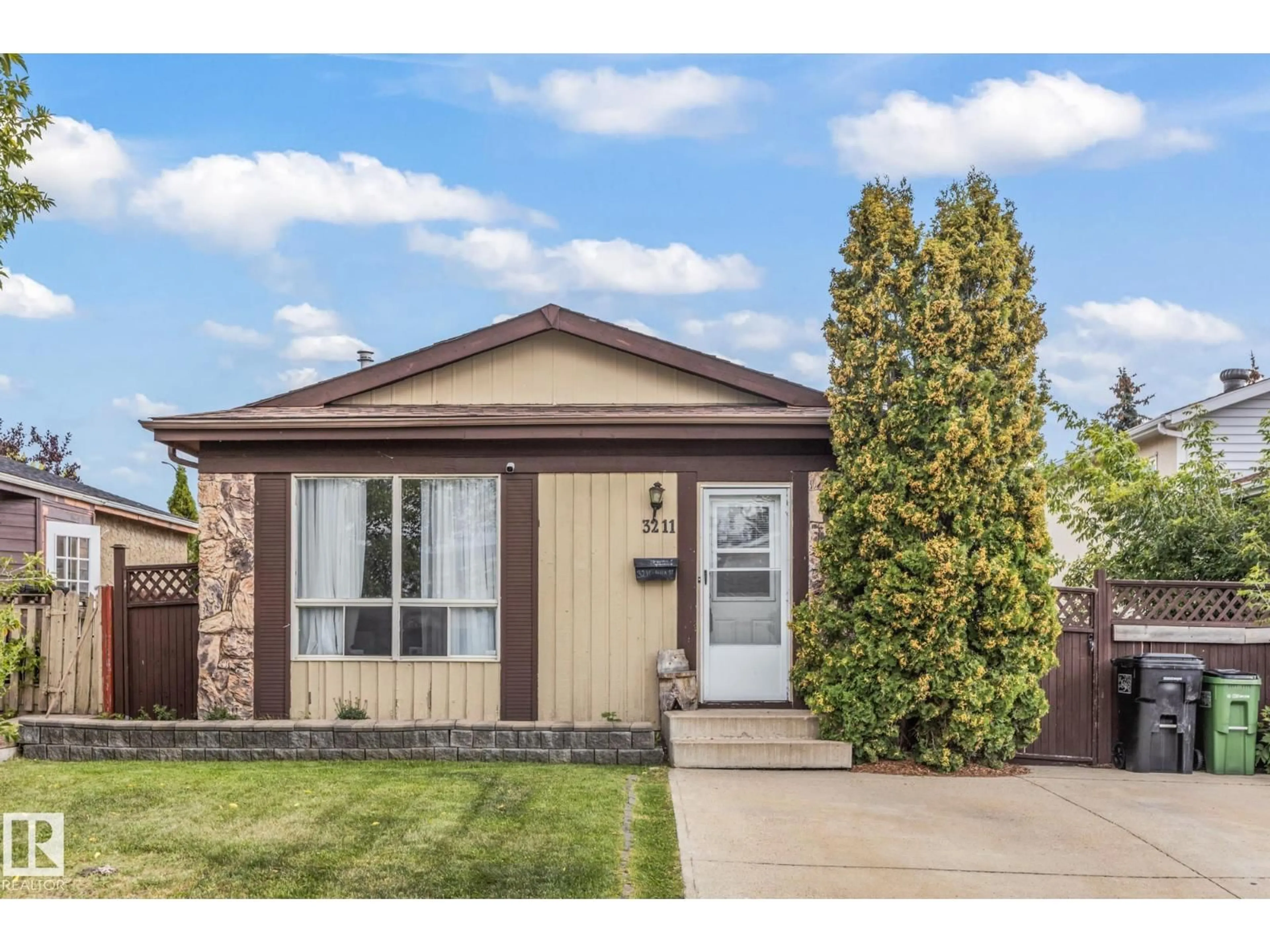 Home with vinyl exterior material, street for 3211 44A ST, Edmonton Alberta T6L4X1