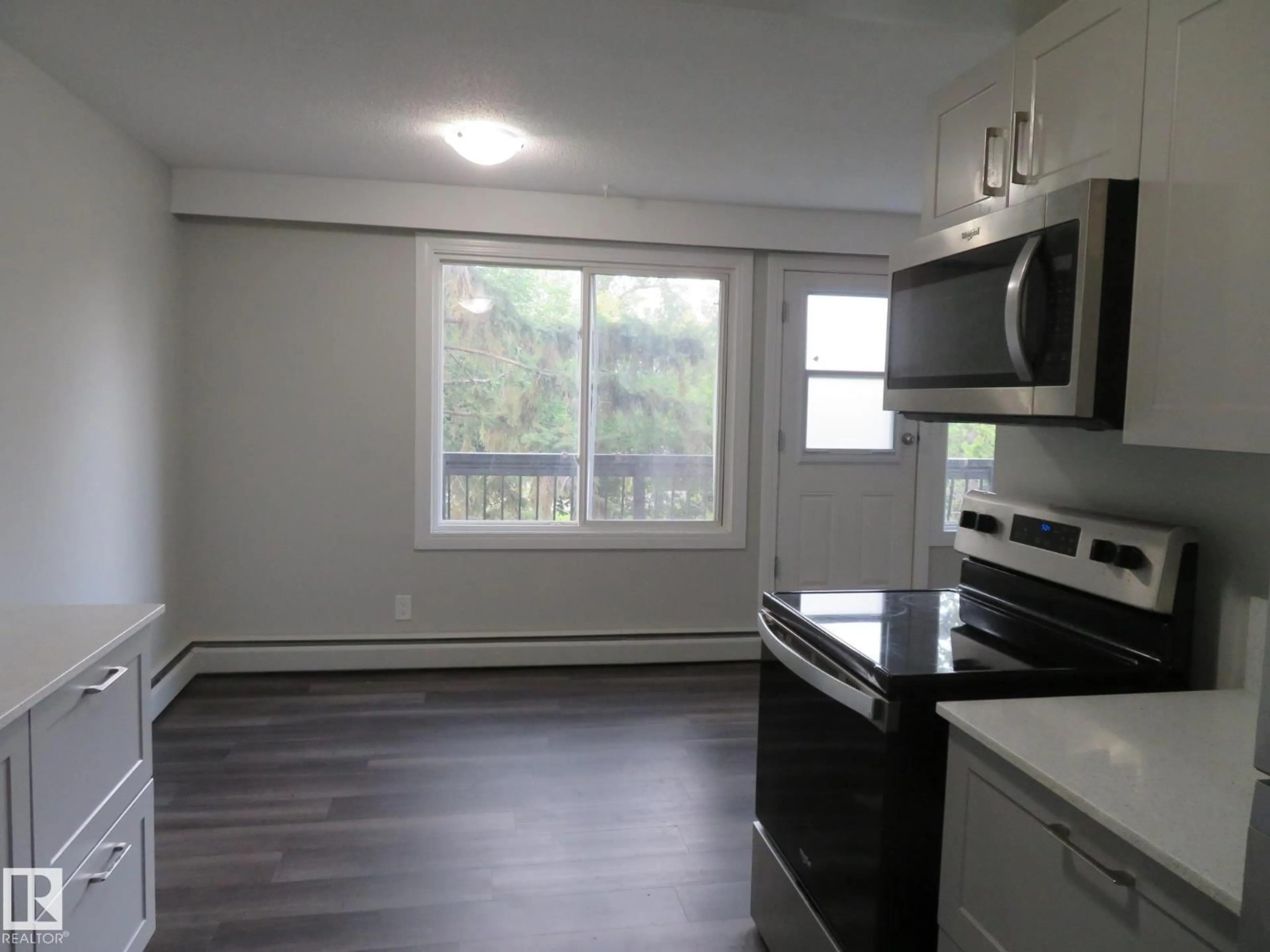Standard kitchen, wood/laminate floor for #205 - 7805 159 ST, Edmonton Alberta T5R2E1