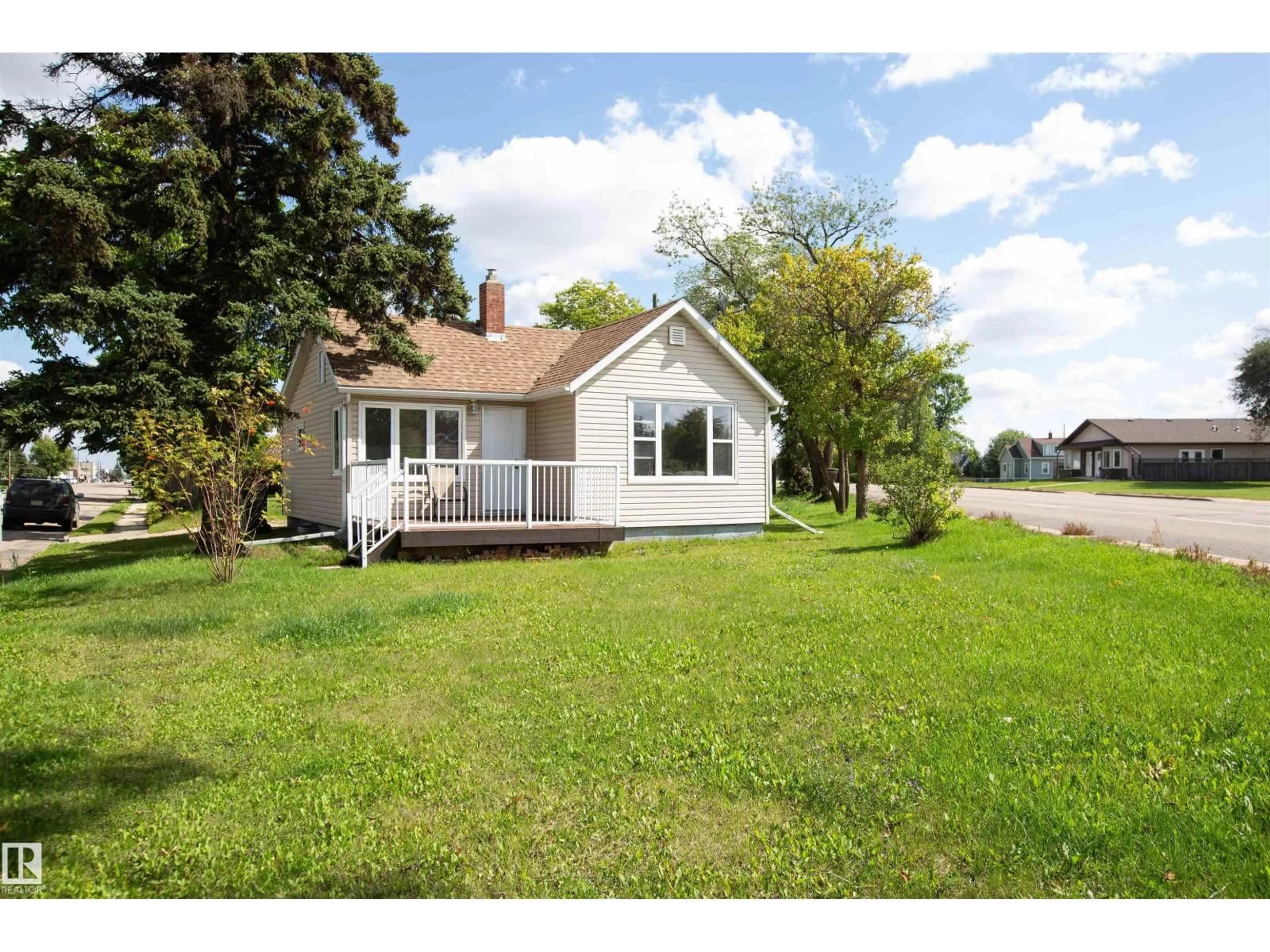 A pic from outside/outdoor area/front of a property/back of a property/a pic from drone, water/lake/river/ocean view for 9735 106 ST, Westlock Alberta T7P1S3