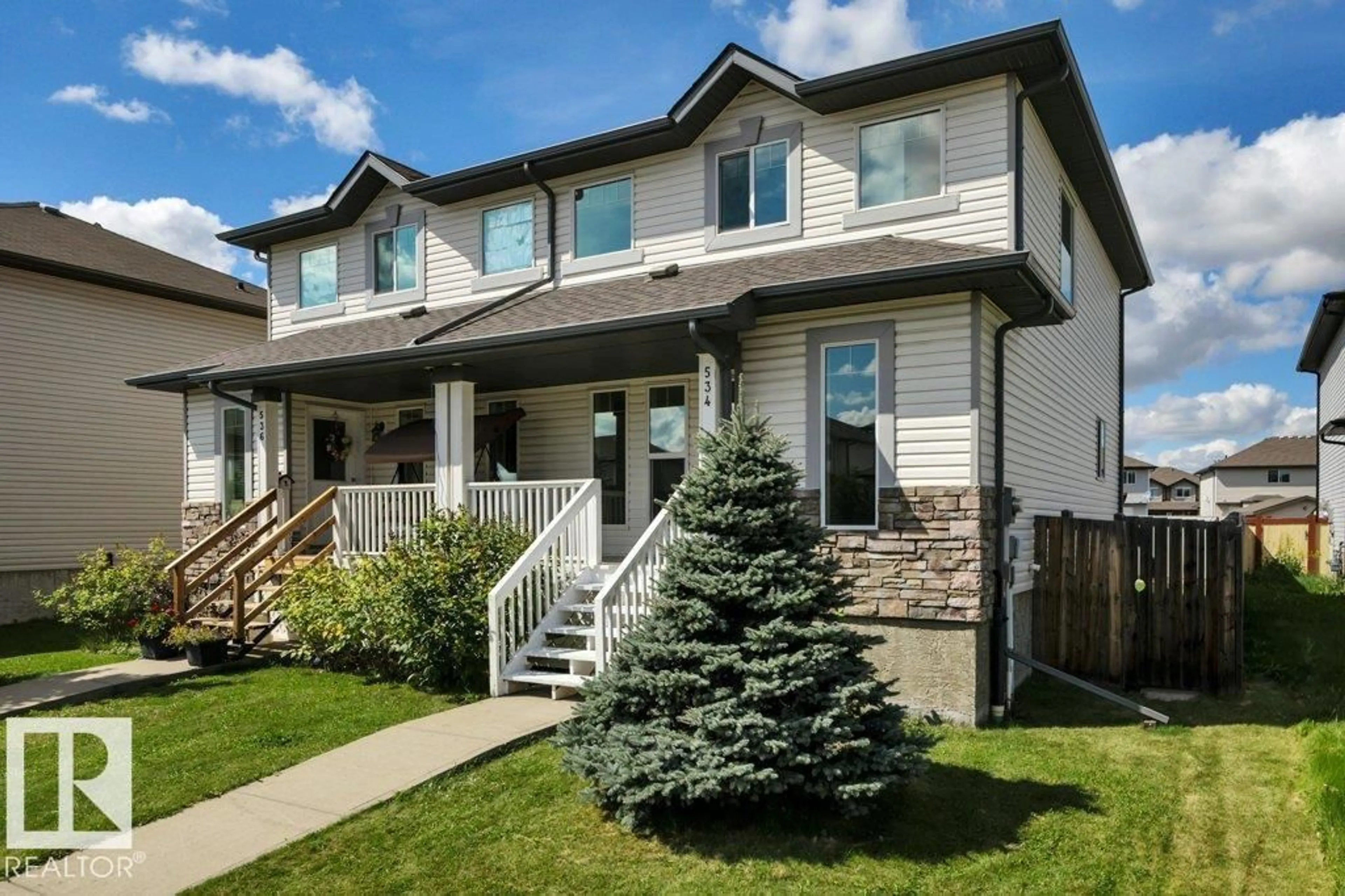 Home with vinyl exterior material, street for 534 SONGHURST WY, Leduc Alberta T9E0P8