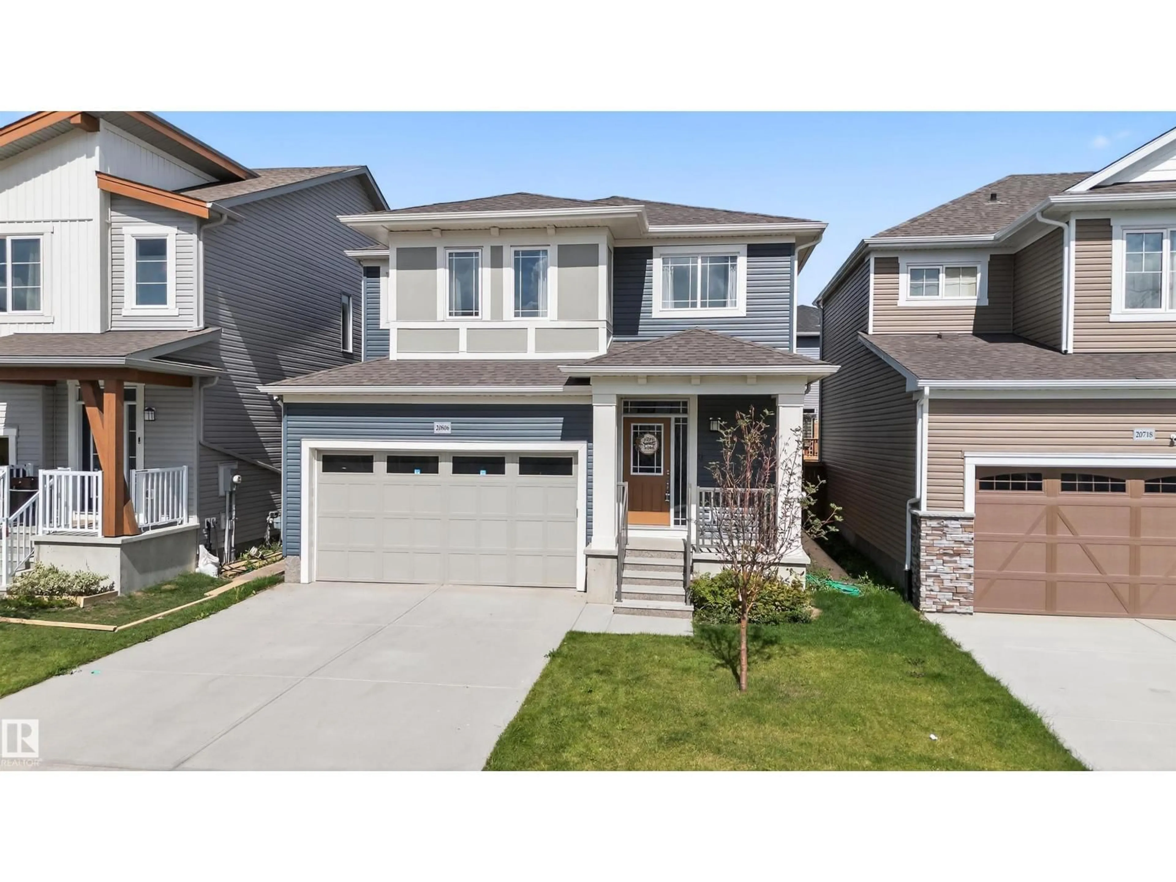 Home with vinyl exterior material, street for 20806 19A AV, Edmonton Alberta T6M1R6