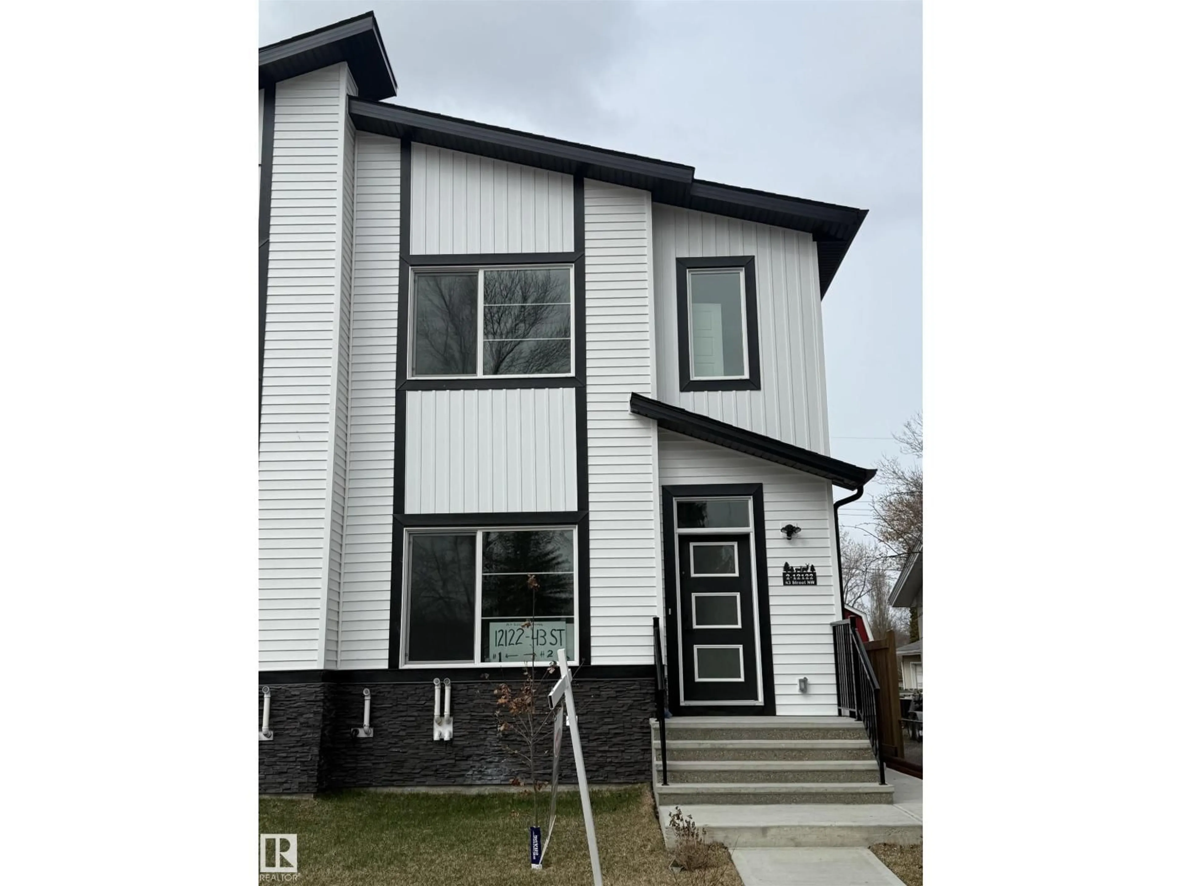 Home with vinyl exterior material, street for 2 - 12122 43 ST, Edmonton Alberta T5W2R1