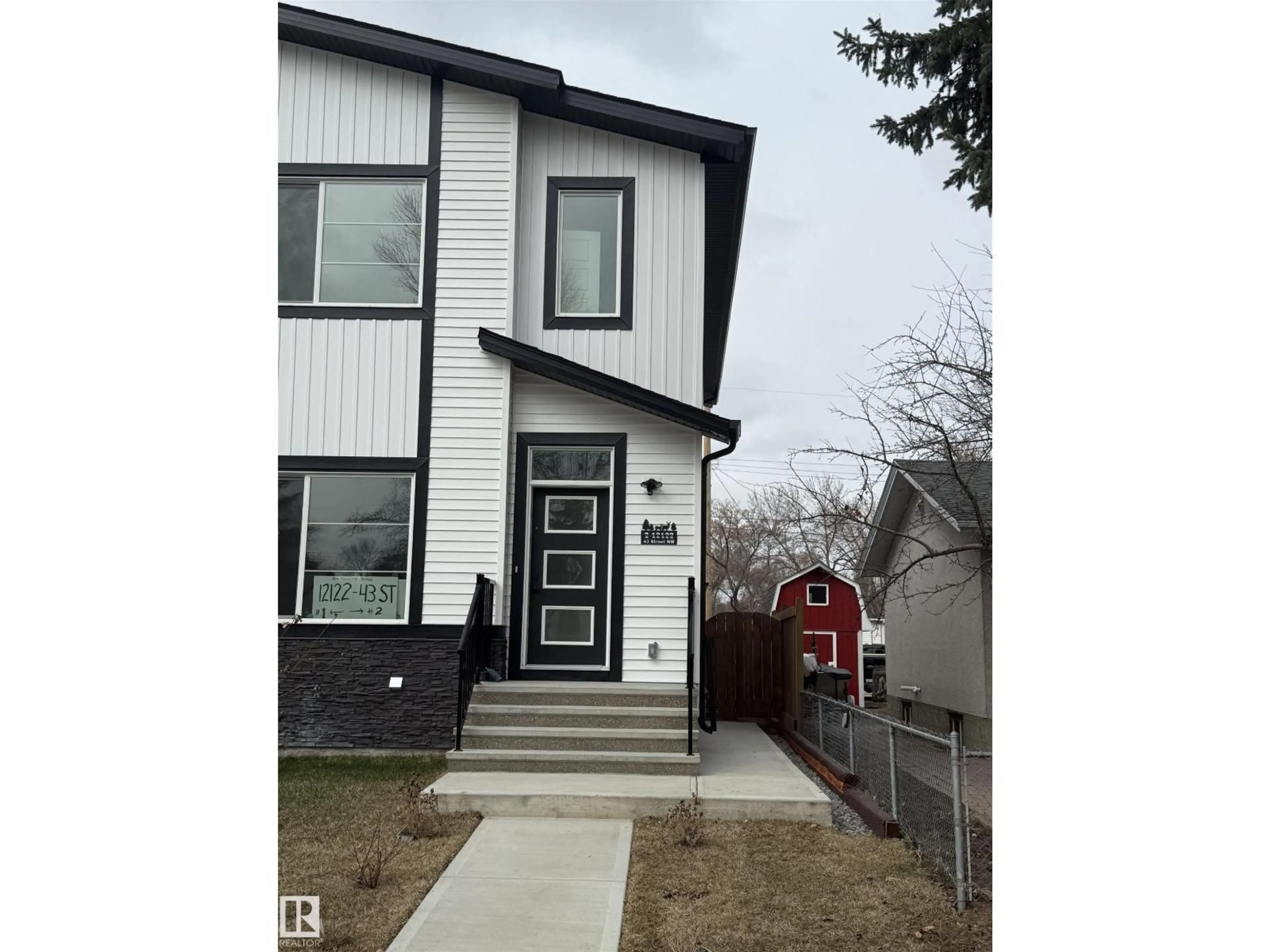 Home with vinyl exterior material, street for 2 - 12122 43 ST, Edmonton Alberta T5W2R1