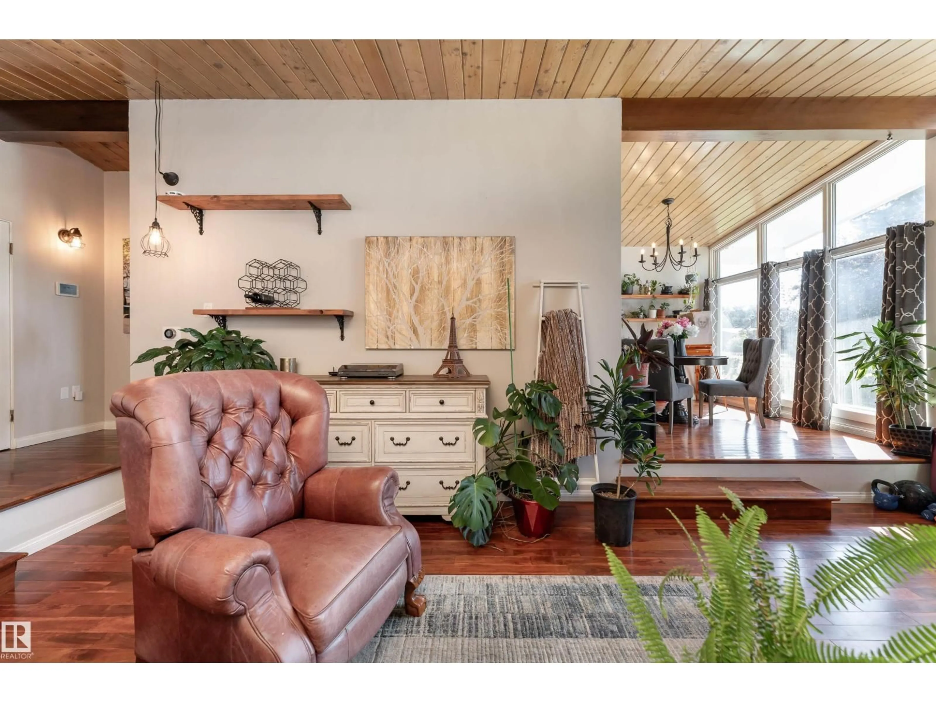 Living room with furniture, wood/laminate floor for 6004 102 AV, Edmonton Alberta T6A0N4