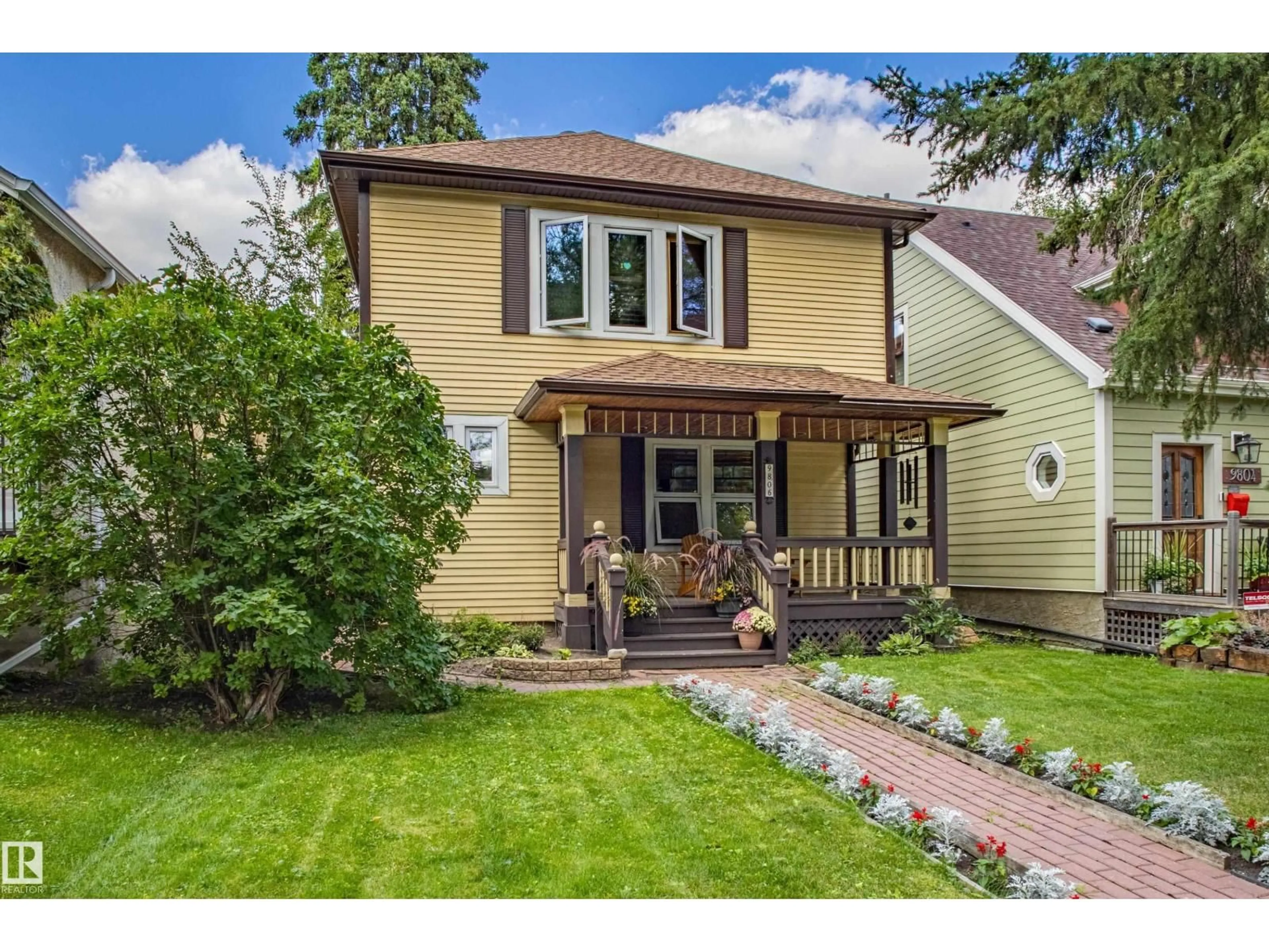 Home with vinyl exterior material, street for NW - 9806 88 AV, Edmonton Alberta T6E2R3