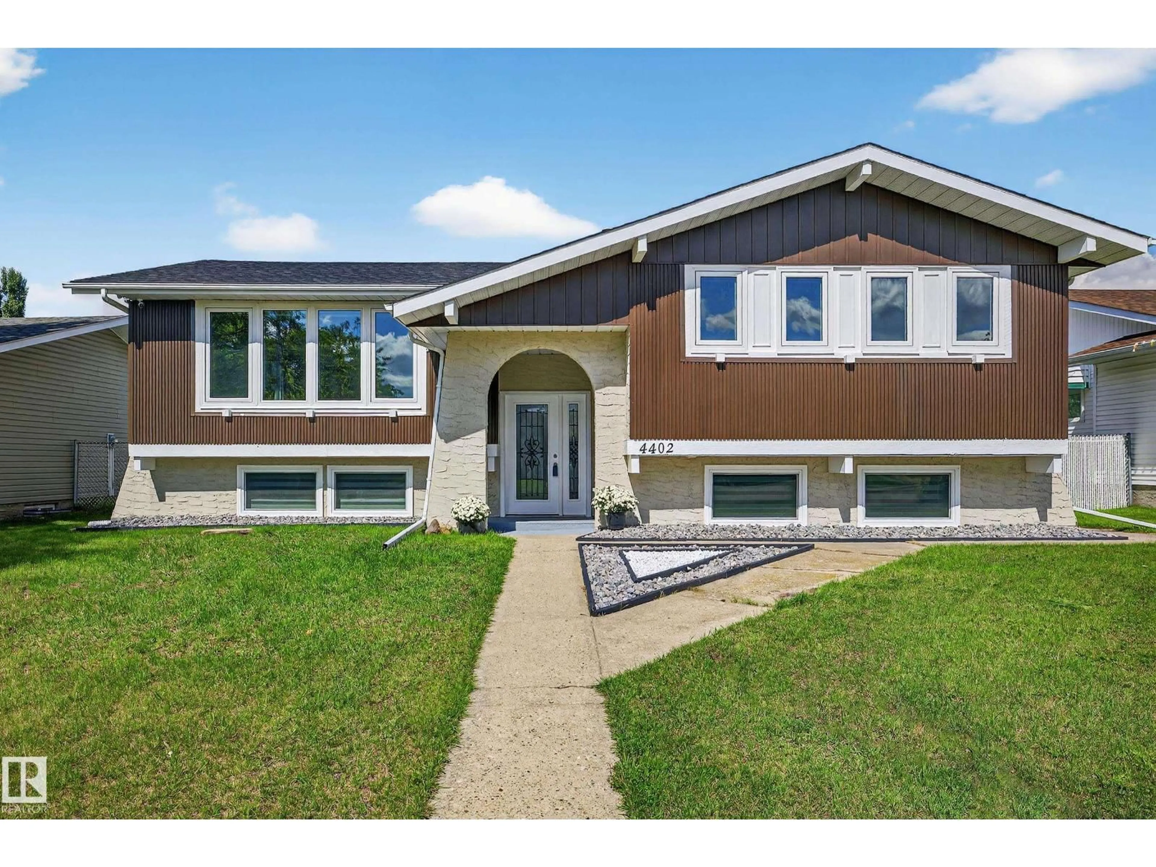 Home with vinyl exterior material, street for 4402 42B AV, Leduc Alberta T9E4R9