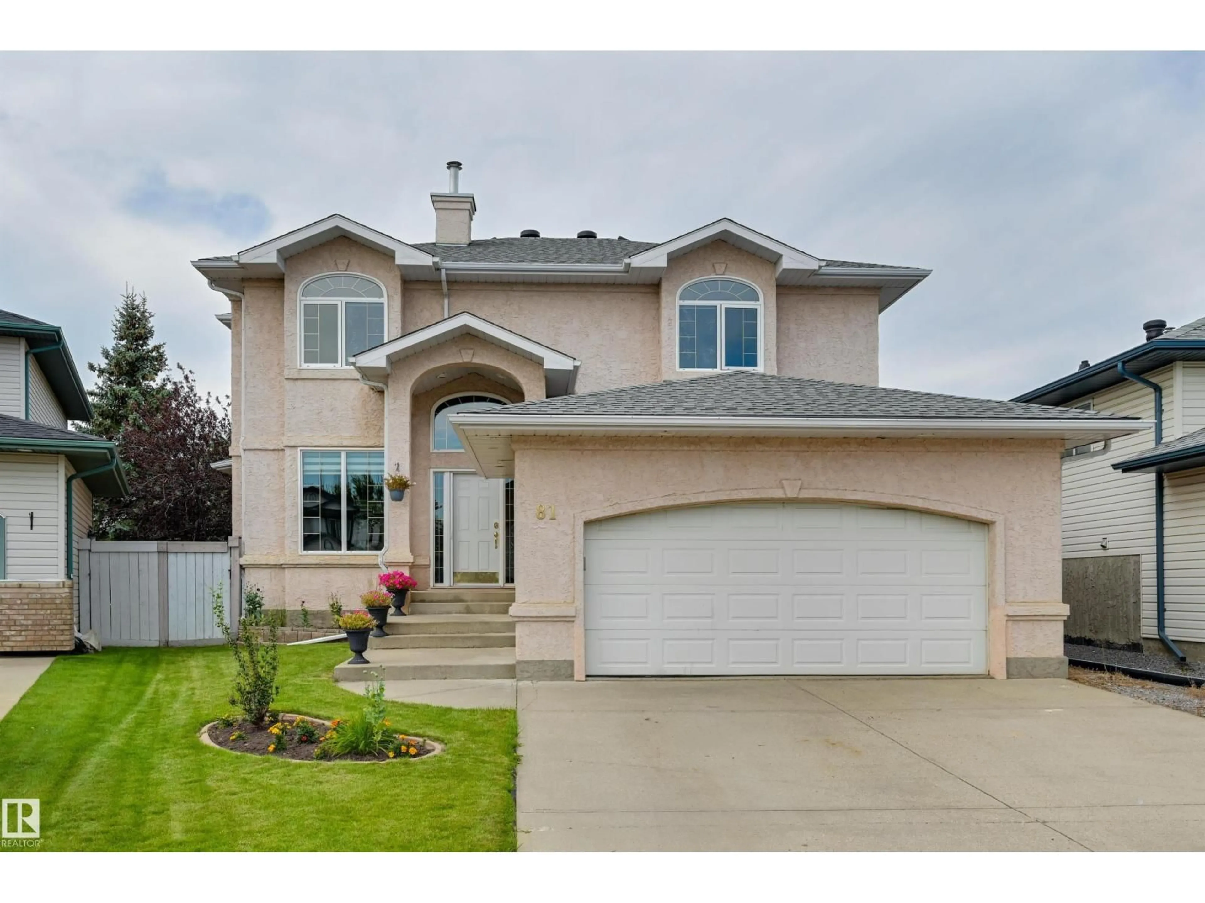 Home with vinyl exterior material, street for 81 DECHENE RD, Edmonton Alberta T6M2M9