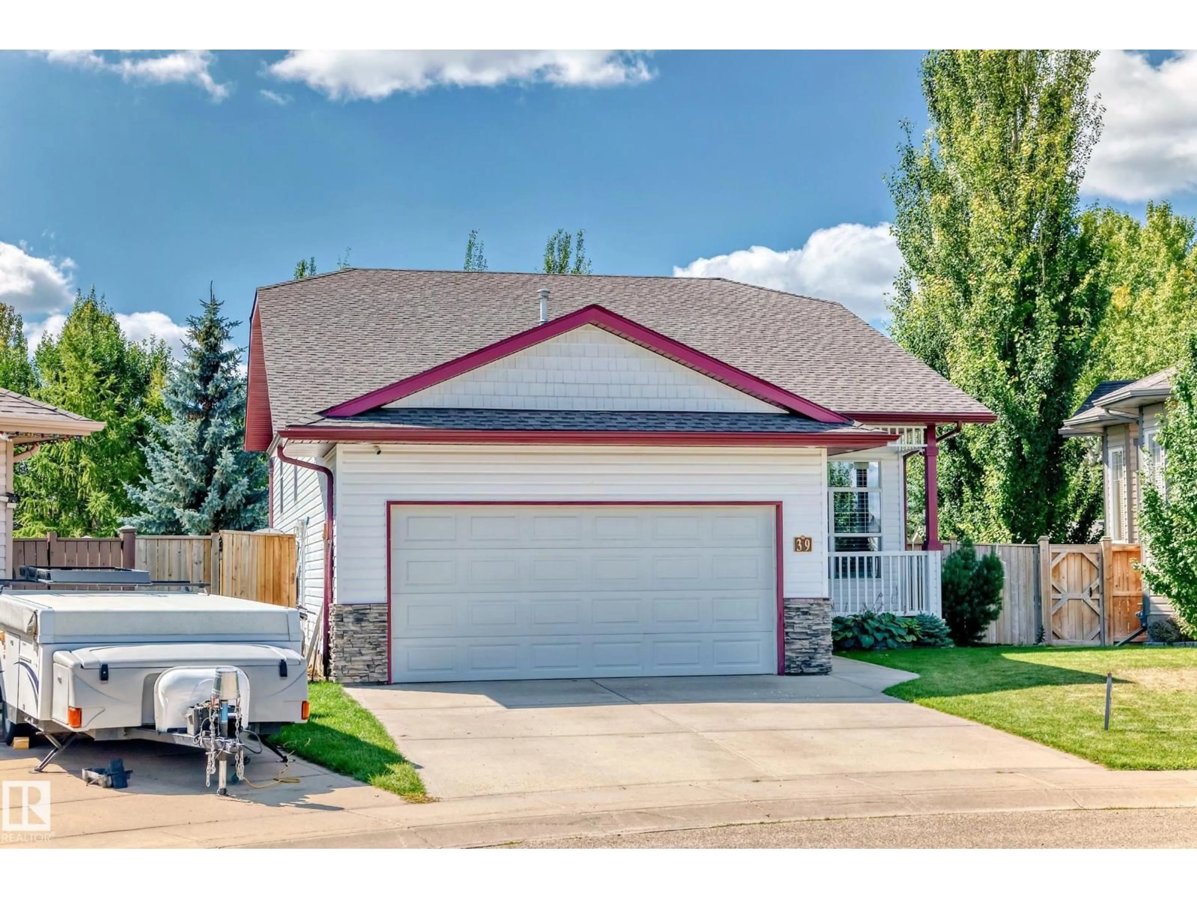 Home with vinyl exterior material, street for 39 KIRTON, Red Deer Alberta T4E4E9