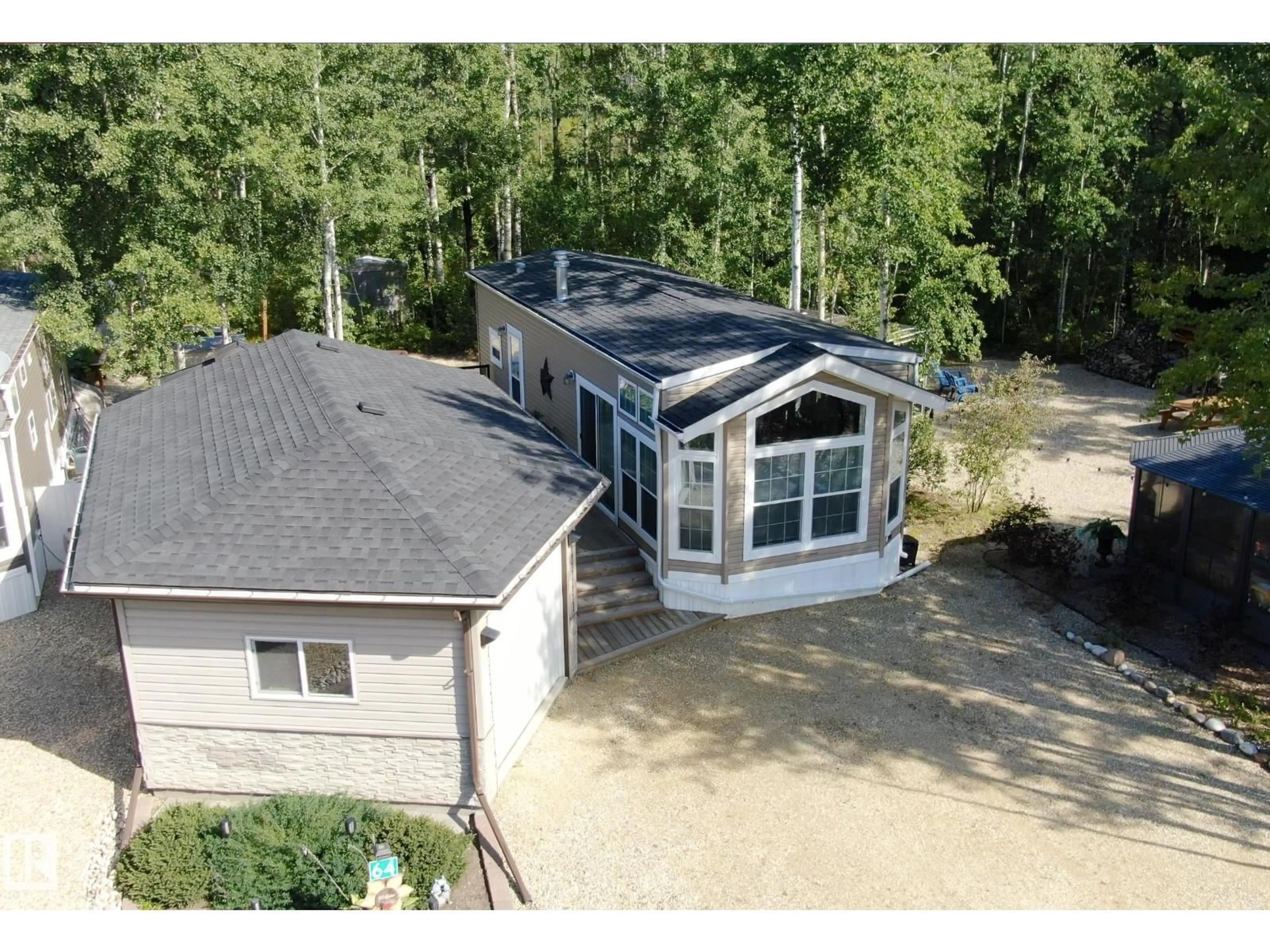 A pic from outside/outdoor area/front of a property/back of a property/a pic from drone, unknown for 64 53206 RGE ROAD 55 A, Rural Parkland County Alberta T0E2B0