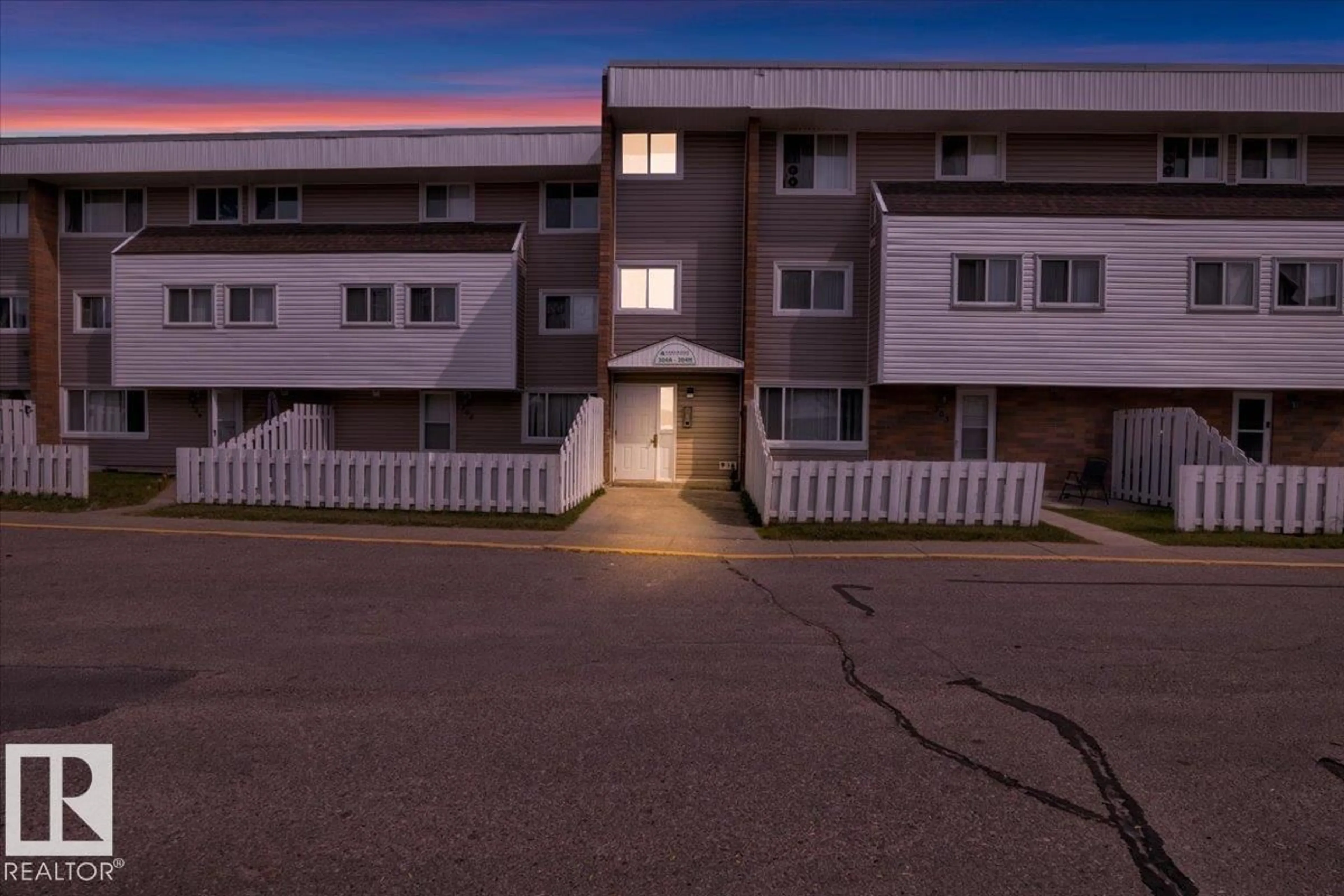A pic from outside/outdoor area/front of a property/back of a property/a pic from drone, street for 304E - 2908 116A AVE, Edmonton Alberta T5W4R7