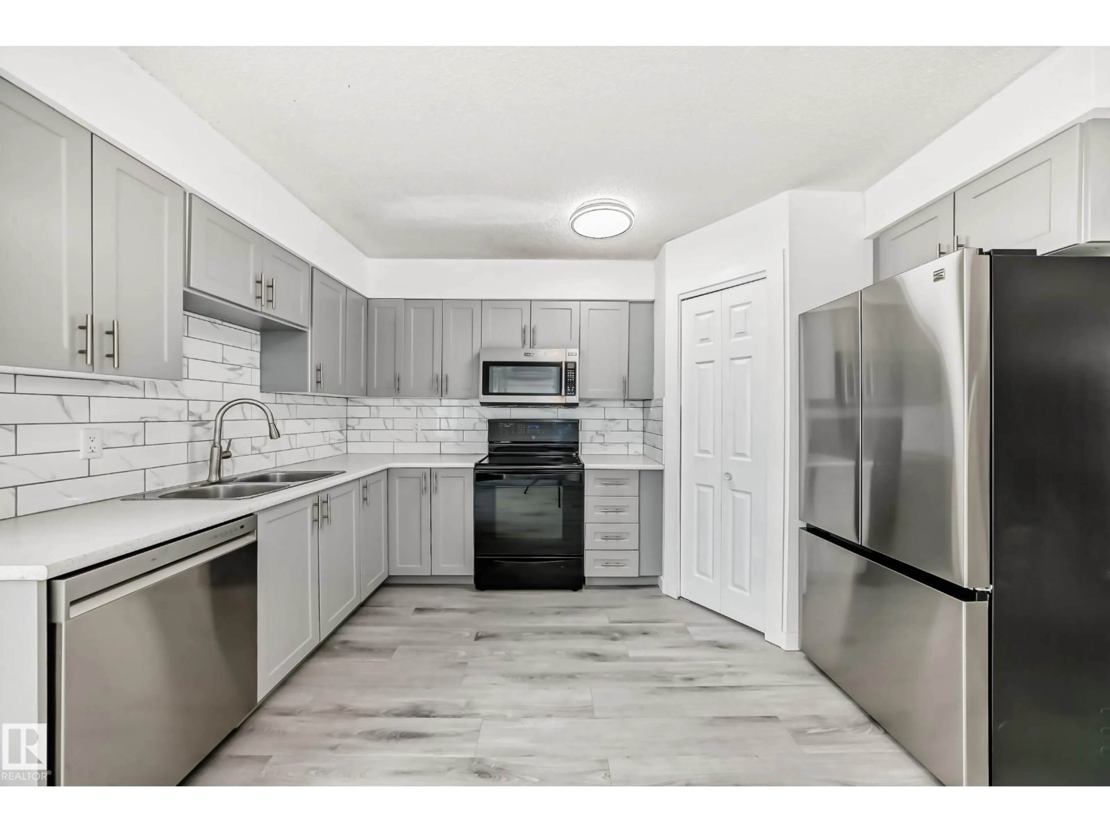 Standard kitchen, ceramic/tile floor for NW - 13116 31 STRRET, Edmonton Alberta T5A3A4