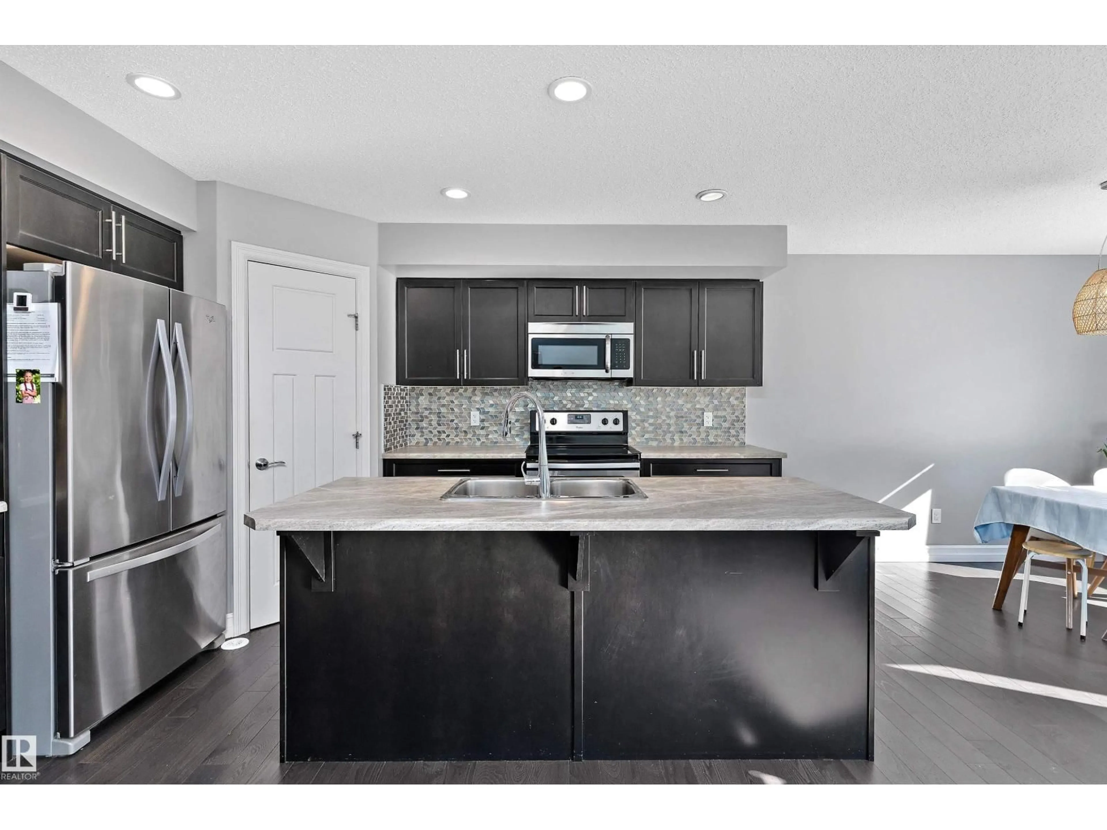 Open concept kitchen, ceramic/tile floor for 5813 64 ST, Beaumont Alberta T4X1Z1