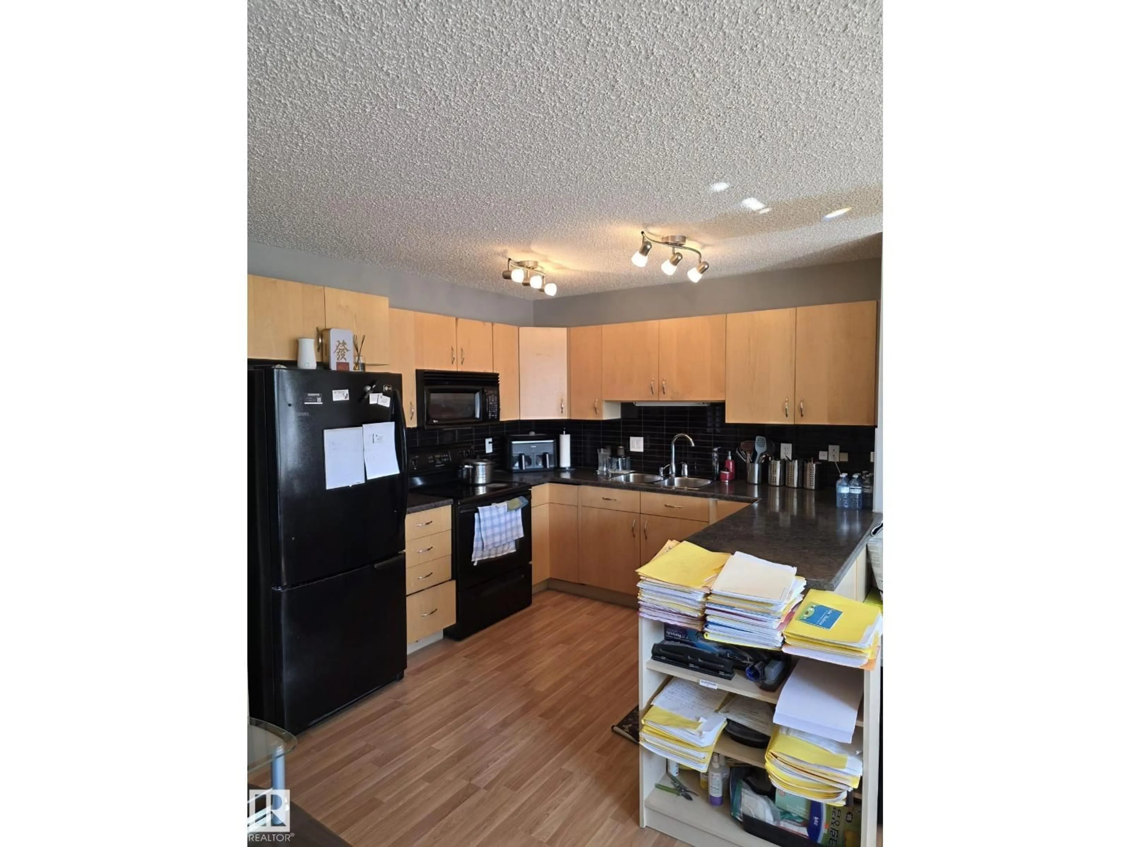 Standard kitchen, wood/laminate floor for 6304 - 11 SANDIN WY, Edmonton Alberta T6R0J8
