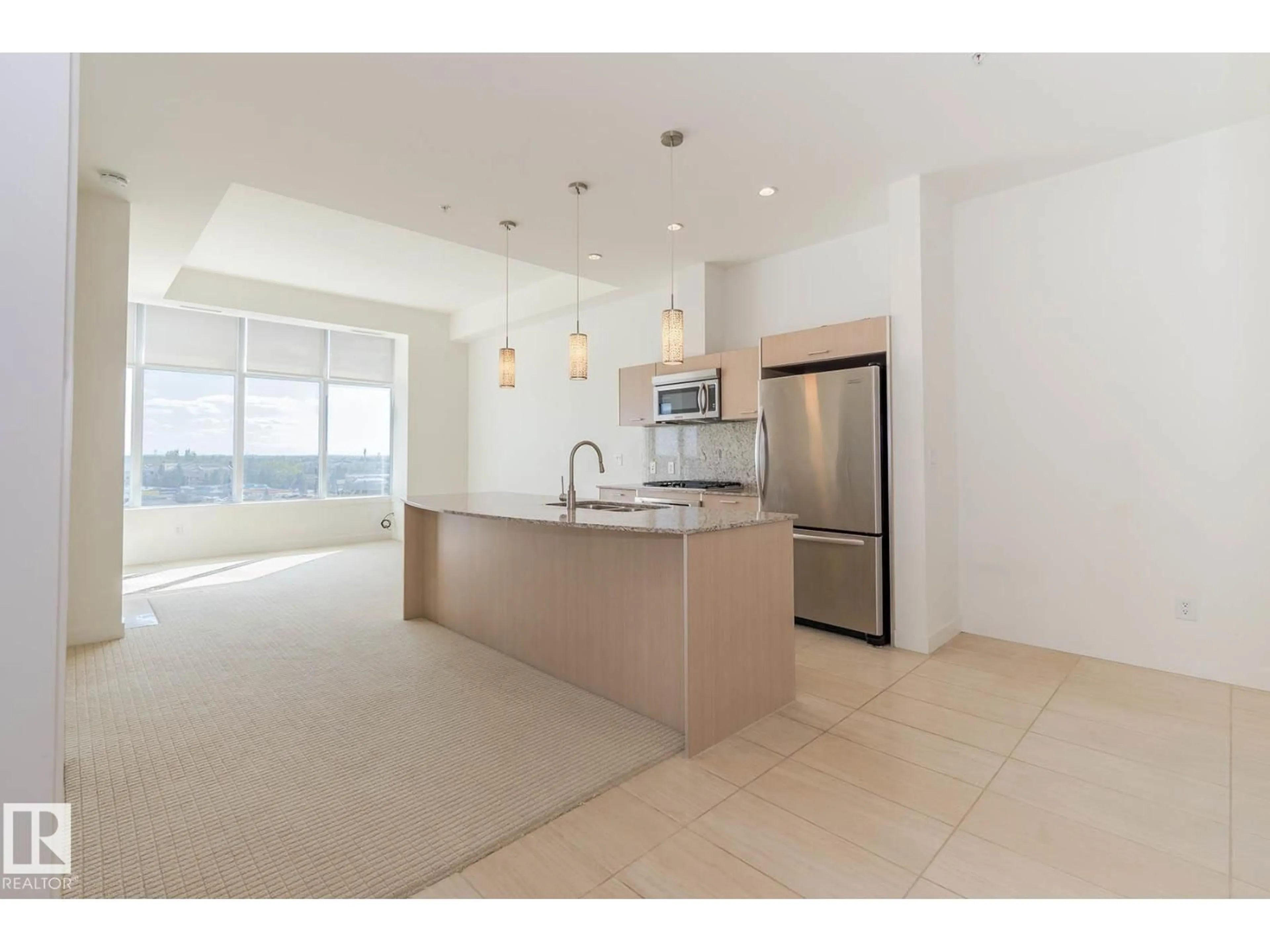 Open concept kitchen, ceramic/tile floor for #703 - 2504 109 ST, Edmonton Alberta T6J2H3