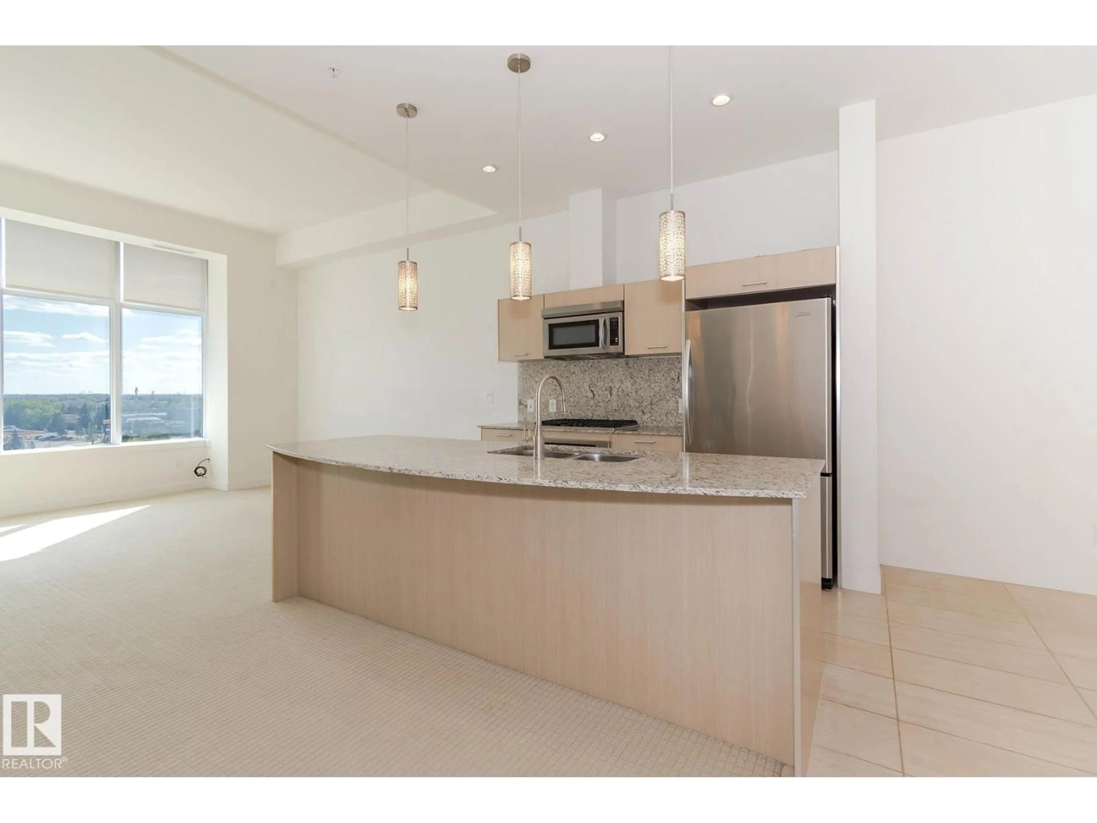 Open concept kitchen, ceramic/tile floor for #703 - 2504 109 ST, Edmonton Alberta T6J2H3