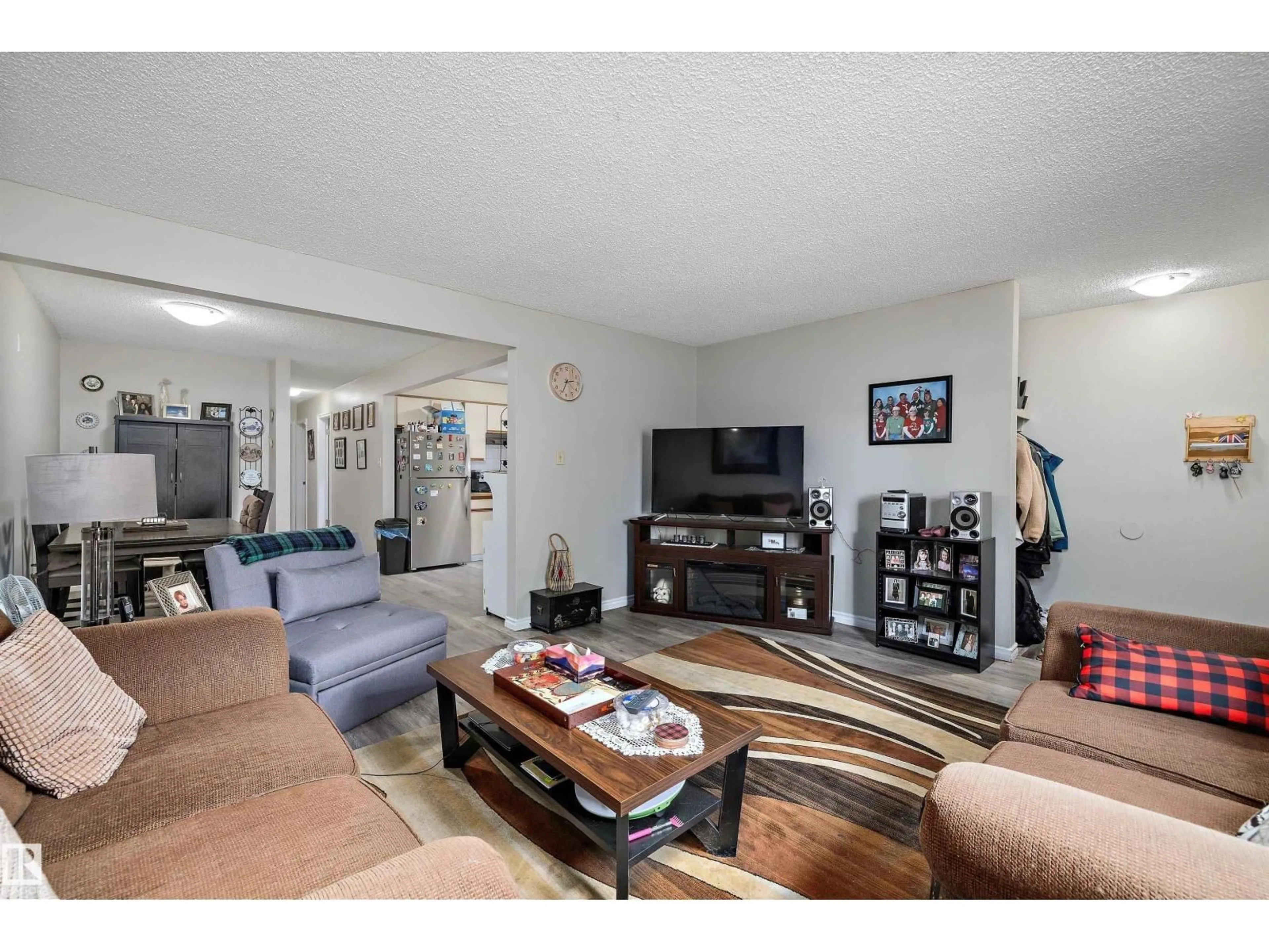 Living room with furniture, unknown for 11911/11913 123 ST, Edmonton Alberta T5M0G4