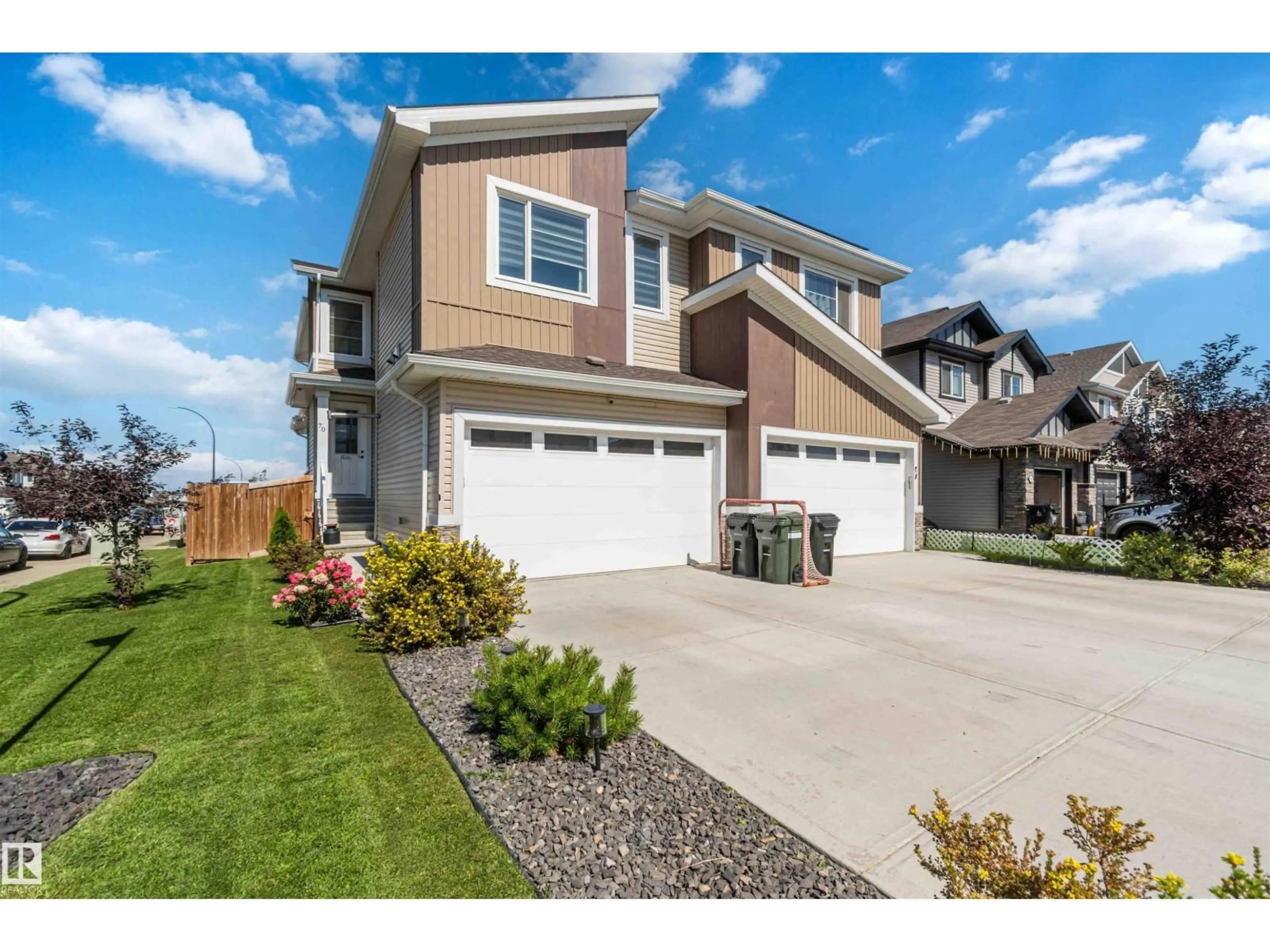 Home with vinyl exterior material, street for 70 SPRINGBROOK WD, Spruce Grove Alberta T7X0X9