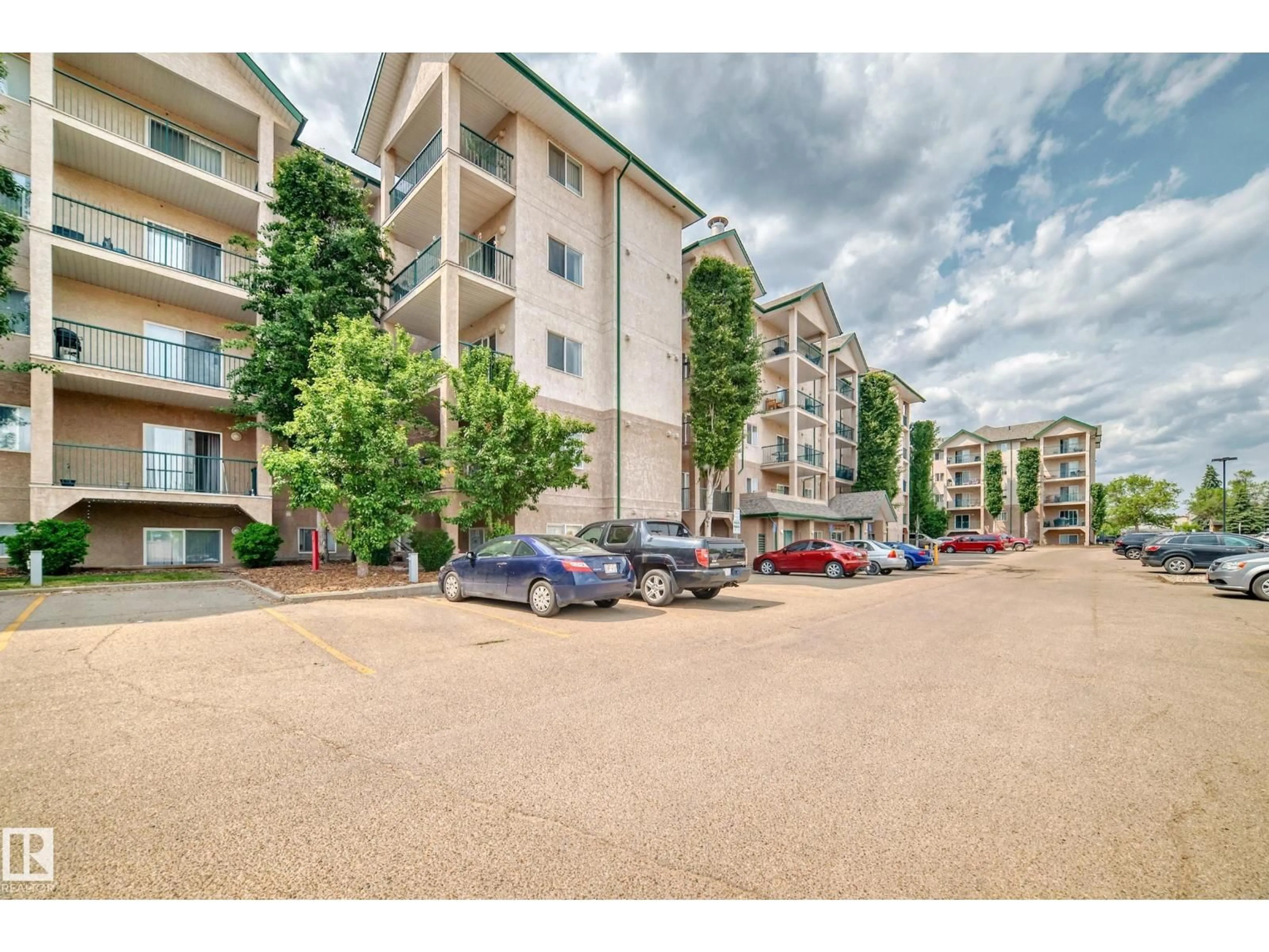 A pic from outside/outdoor area/front of a property/back of a property/a pic from drone, street for 306 - 11325 83 ST, Edmonton Alberta T5B4W5