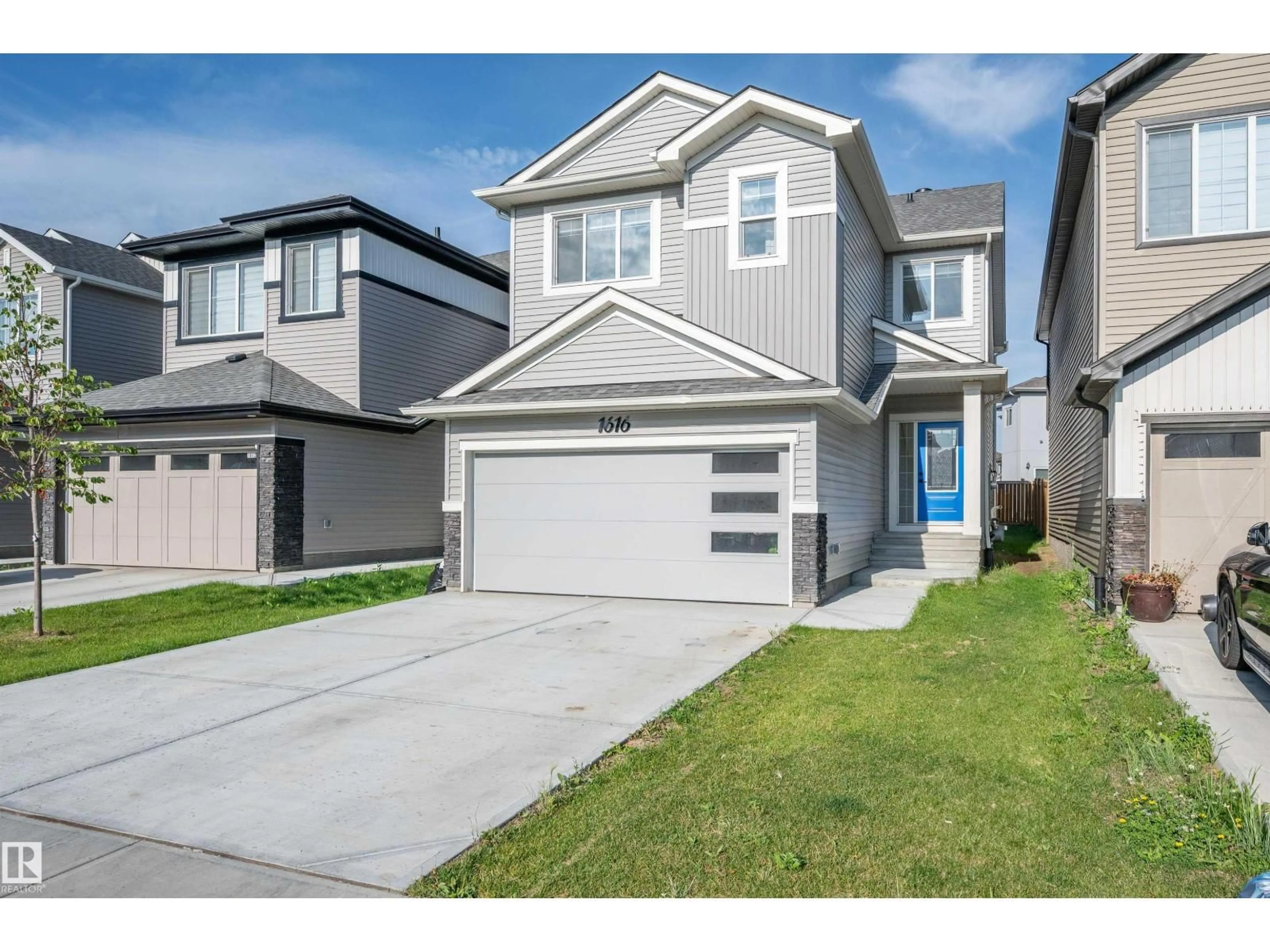 Home with vinyl exterior material, street for 1616 16 ST, Edmonton Alberta T6T2S1