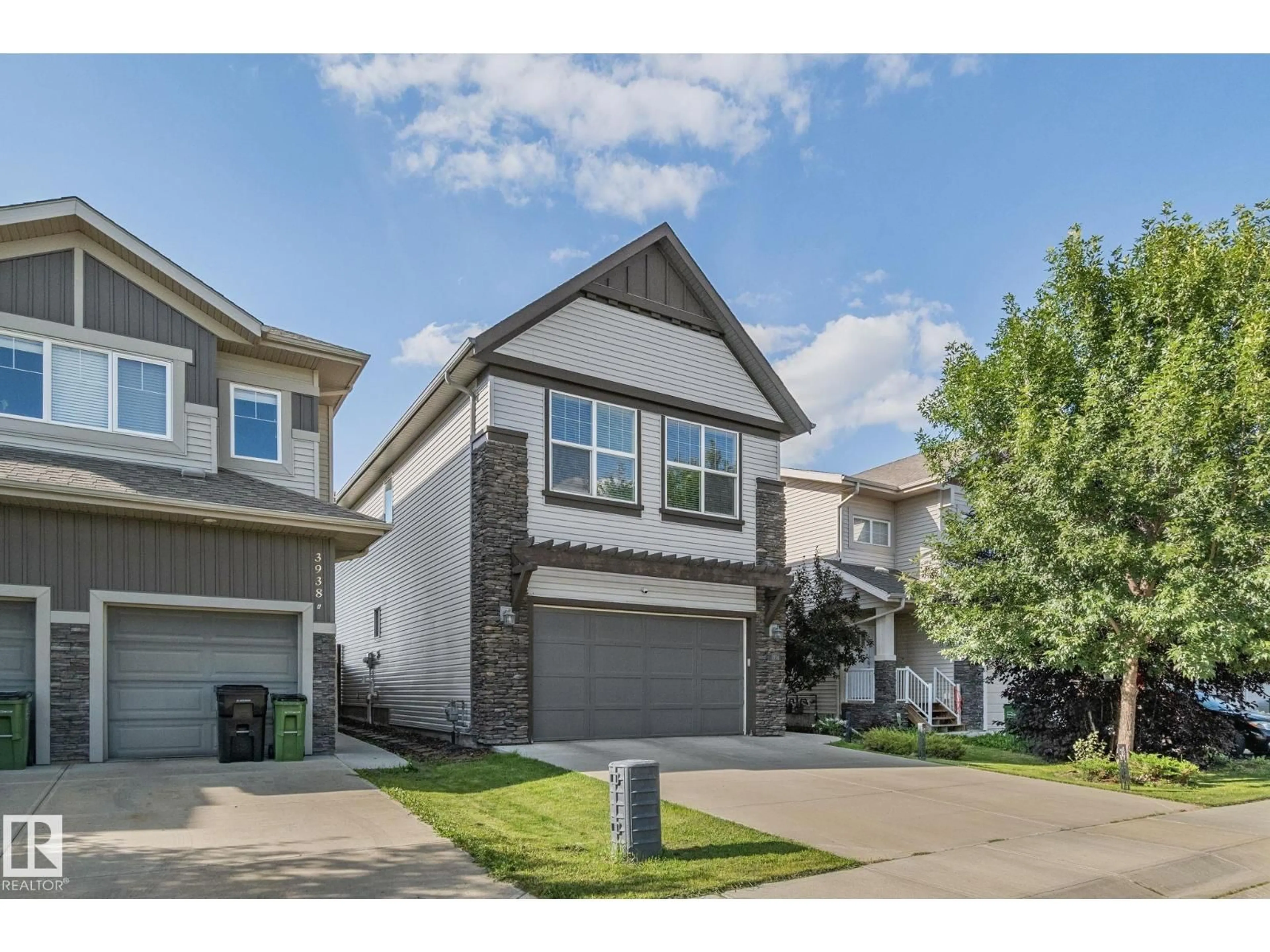 Home with vinyl exterior material, street for SW - 3936 CLAXTON LO, Edmonton Alberta T6W1Y6