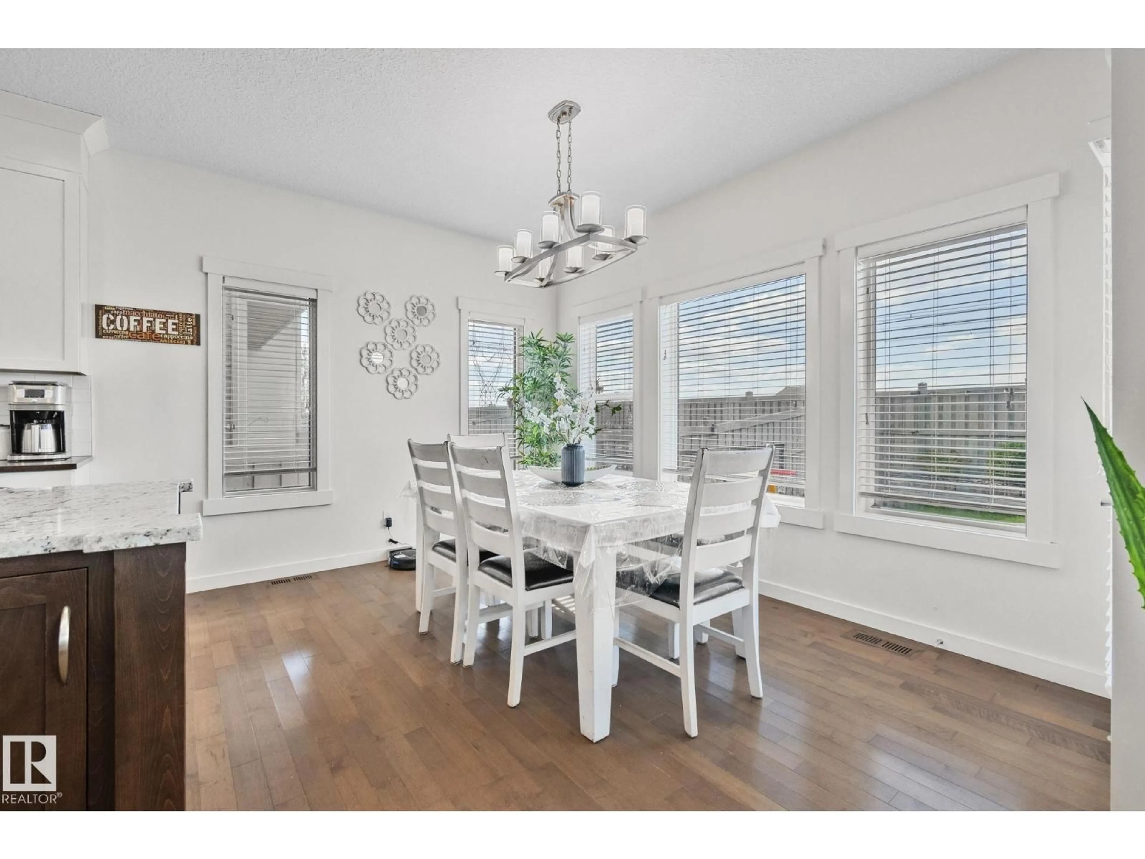 Dining room, wood/laminate floor for SW - 3936 CLAXTON LO, Edmonton Alberta T6W1Y6