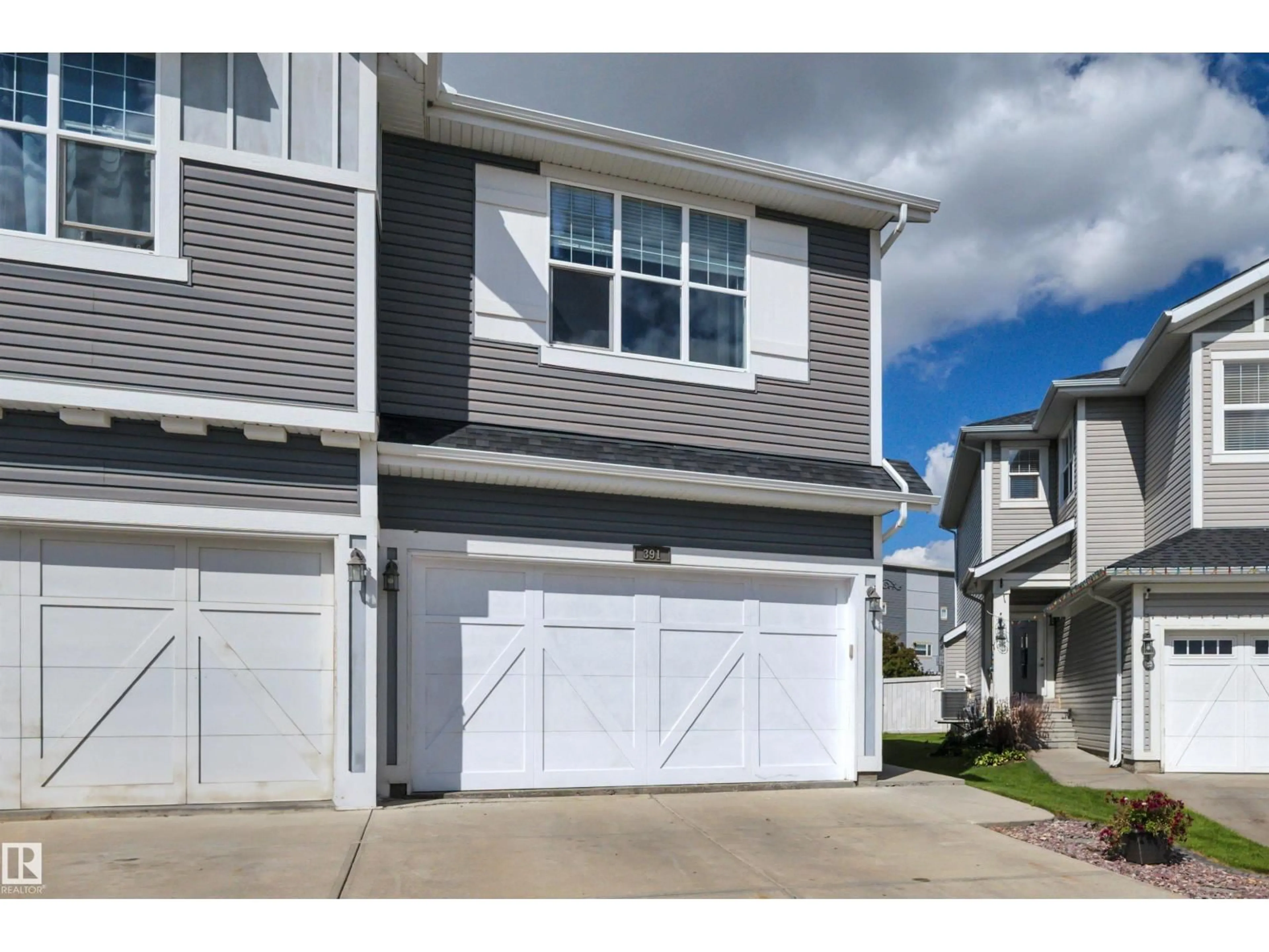Home with vinyl exterior material, street for 391 SIMMONDS WY, Leduc Alberta T9E0T9