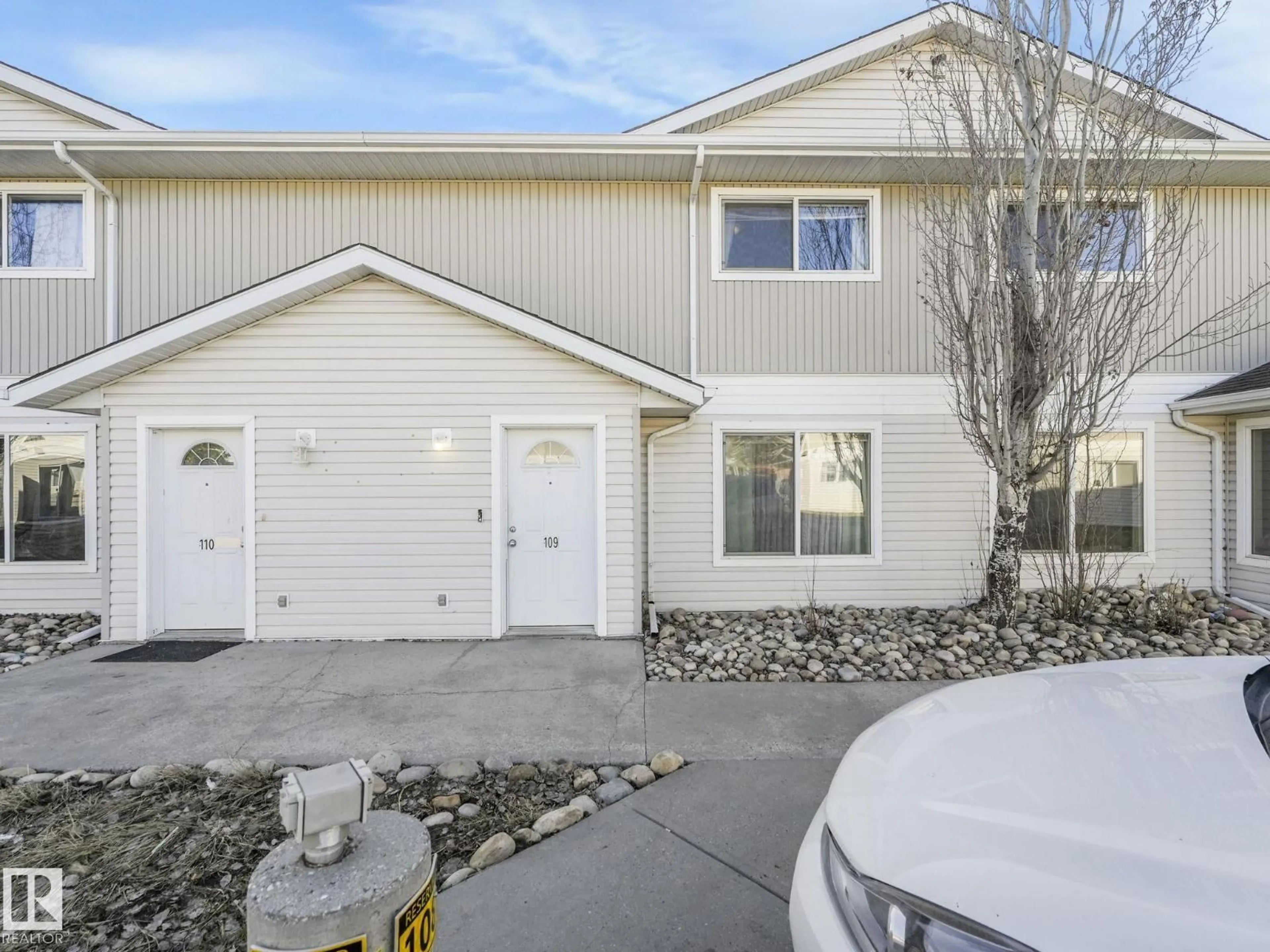 Home with vinyl exterior material, street for #109 - 180 BRIDGEPORT BV, Leduc Alberta T9E8S1