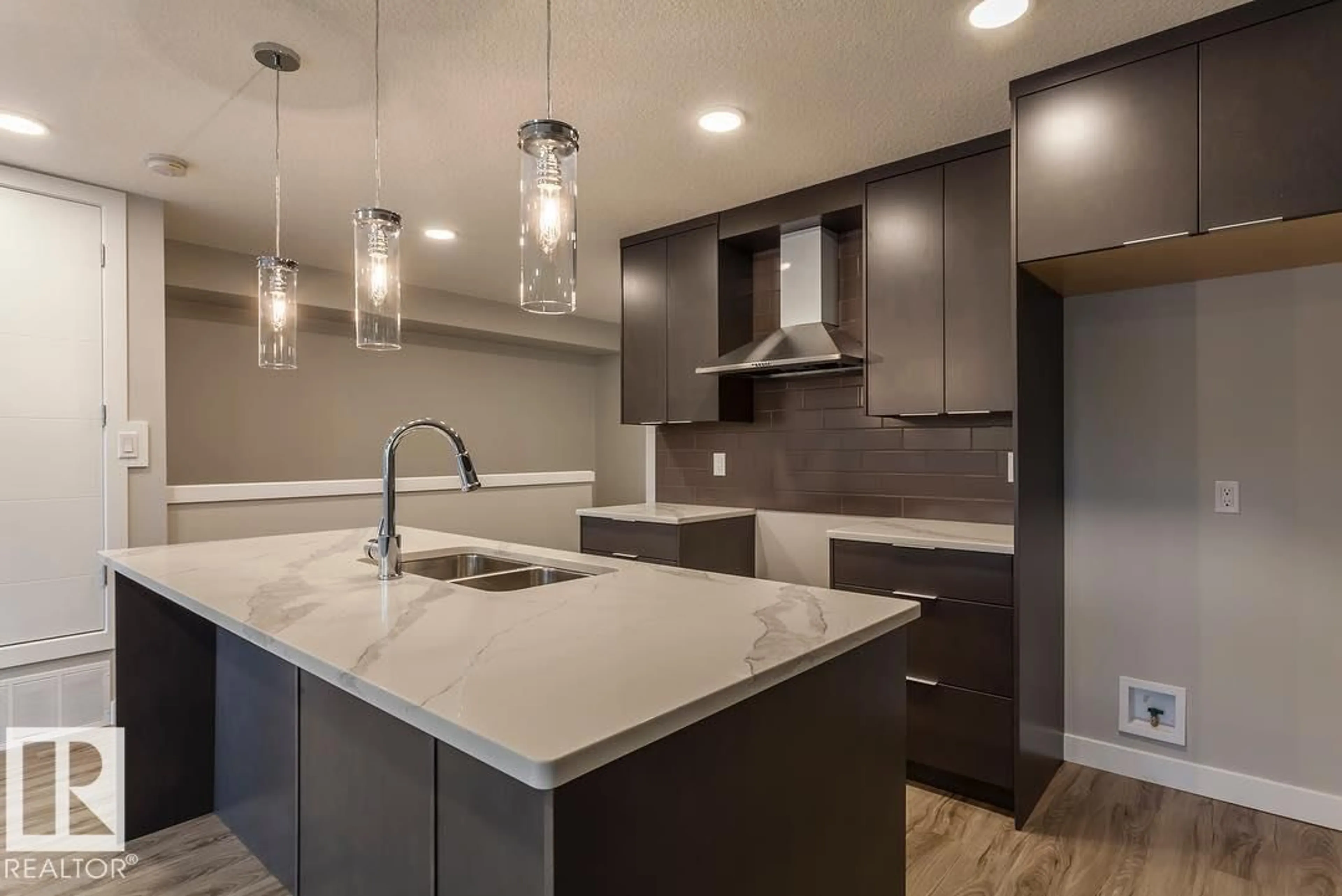 Open concept kitchen, unknown for #103 - 10736 116 ST NW, Edmonton Alberta T5H3M2