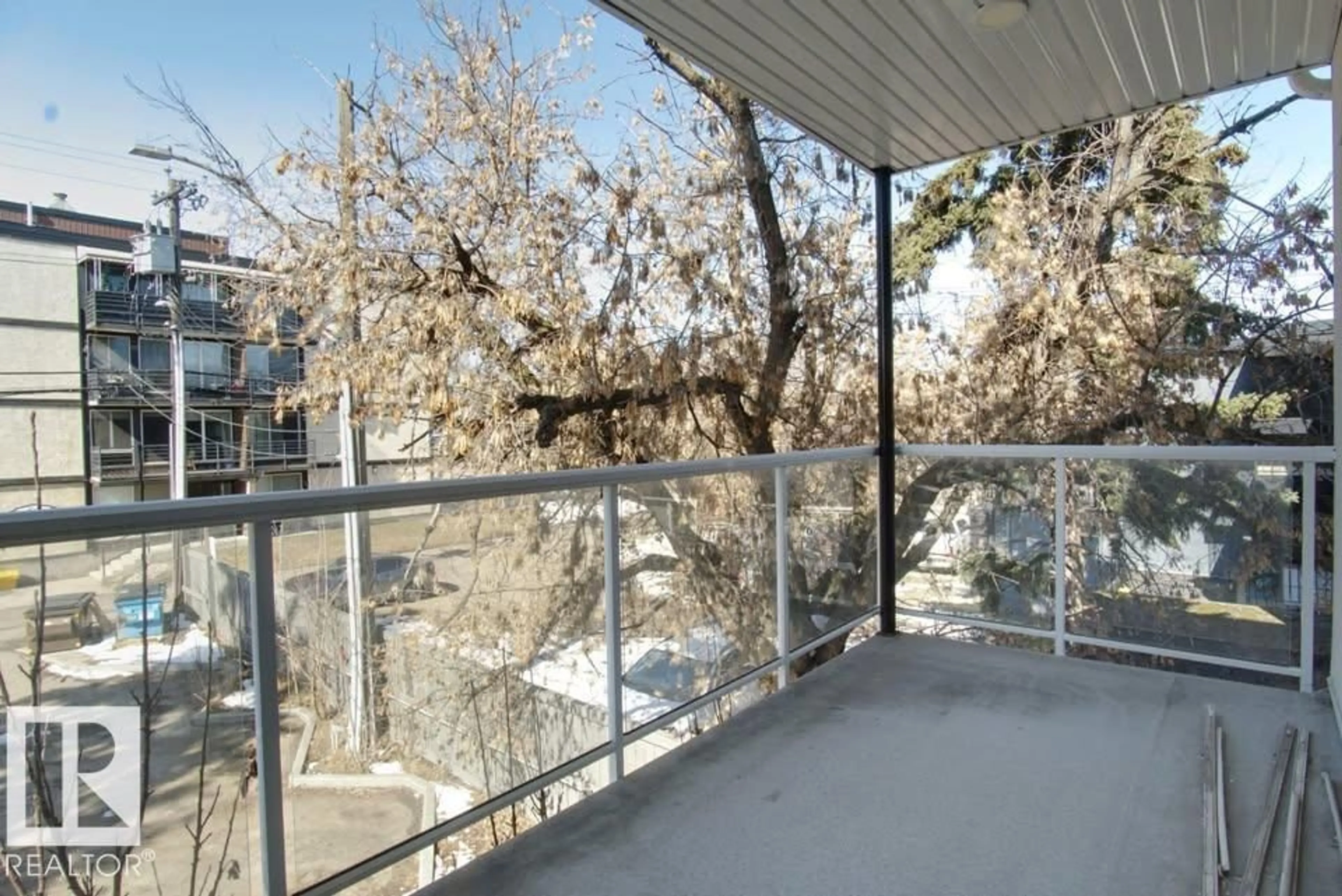 Balcony in the apartment, city buildings view from balcony for 202 - 10736 116 ST, Edmonton Alberta T5H3M2