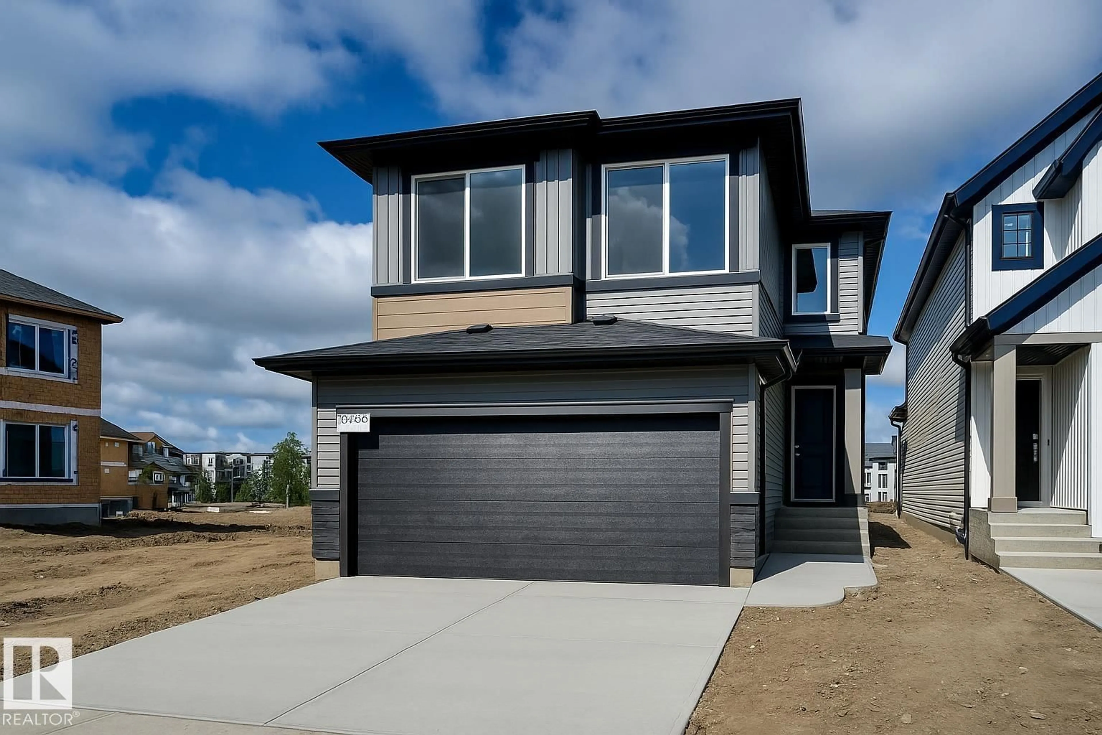 Home with vinyl exterior material, street for 9106 ELVES LO, Edmonton Alberta T6M3G2