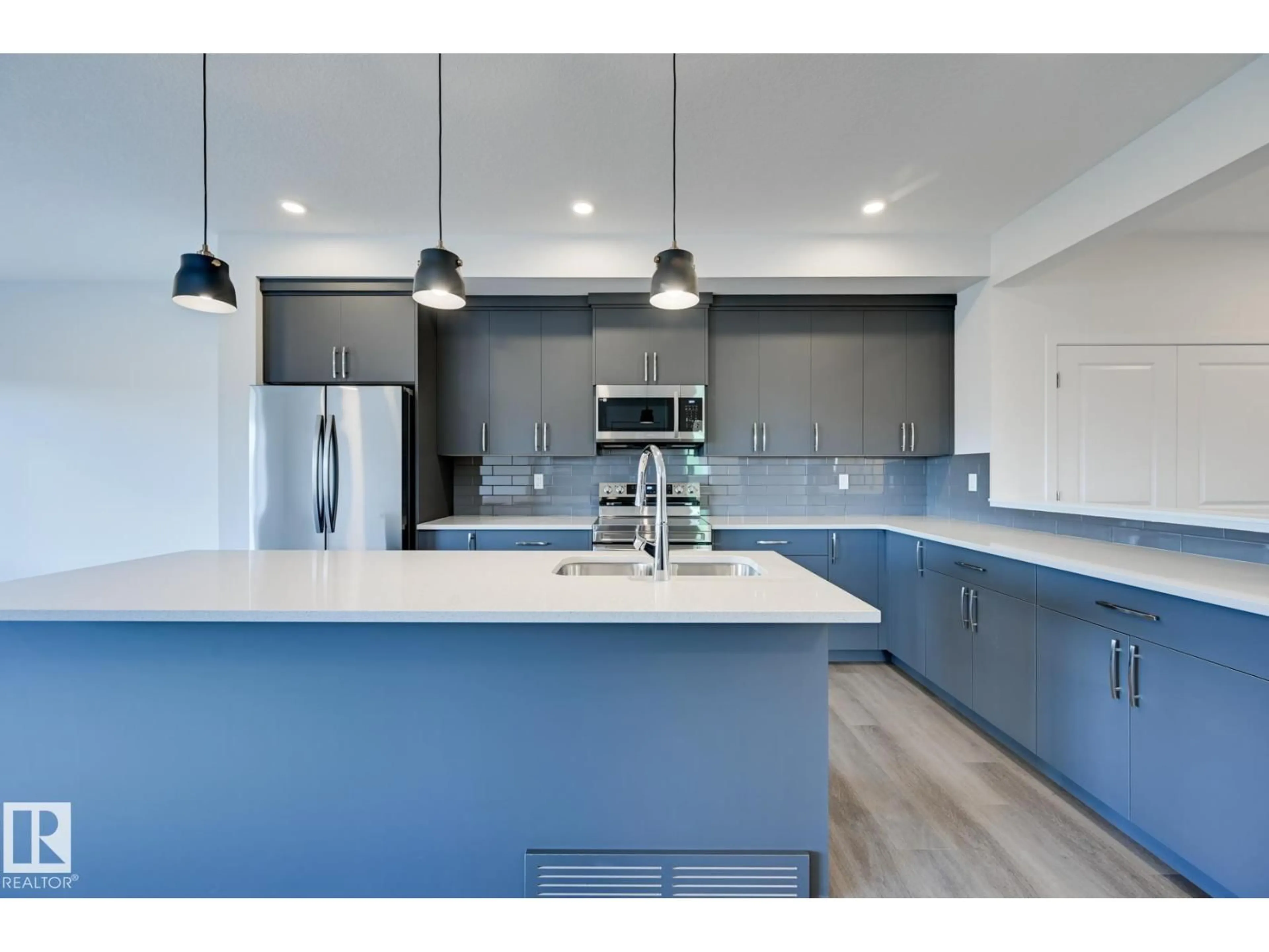 Open concept kitchen, unknown for 9106 ELVES LO, Edmonton Alberta T6M3G2