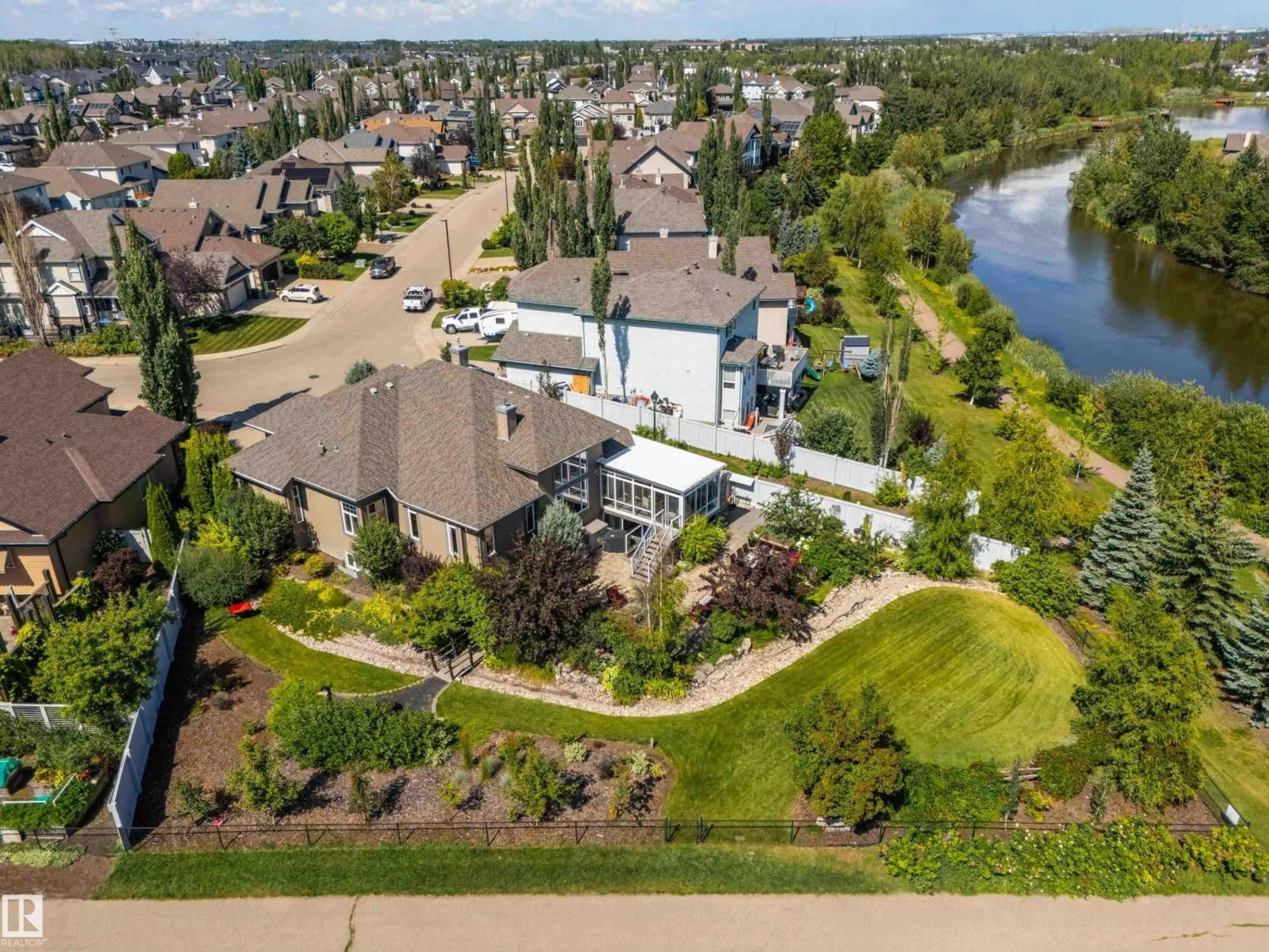 A pic from outside/outdoor area/front of a property/back of a property/a pic from drone, water/lake/river/ocean view for CI NW - 1089 GOODWIN CIRCLE, Edmonton Alberta T5T6W4