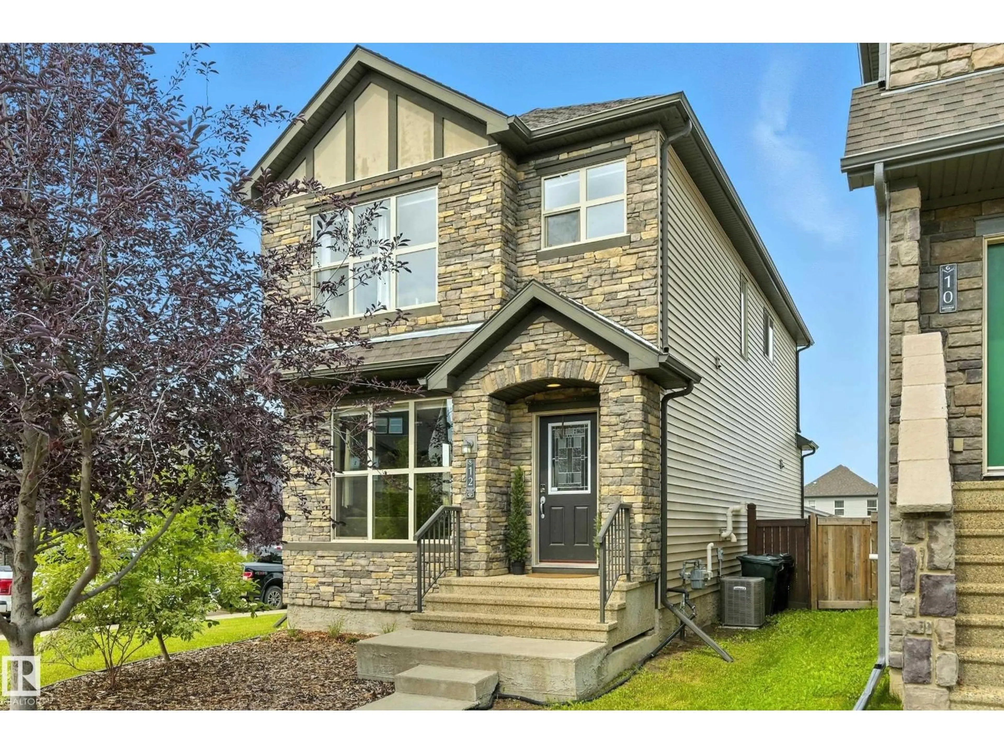 Home with brick exterior material, street for 12 GREENBURY CR, Spruce Grove Alberta T7X0L9