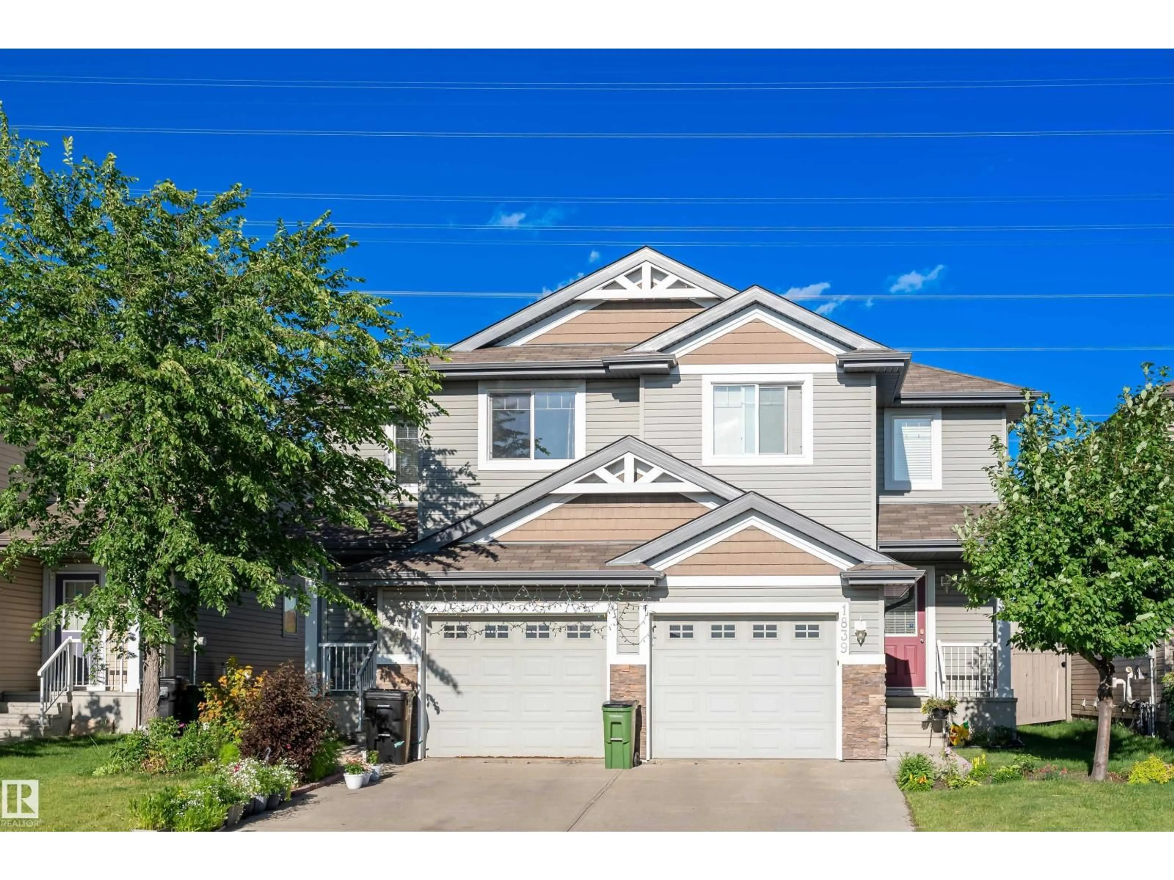 Home with vinyl exterior material, street for 1841 28 ST, Edmonton Alberta T6T0N8