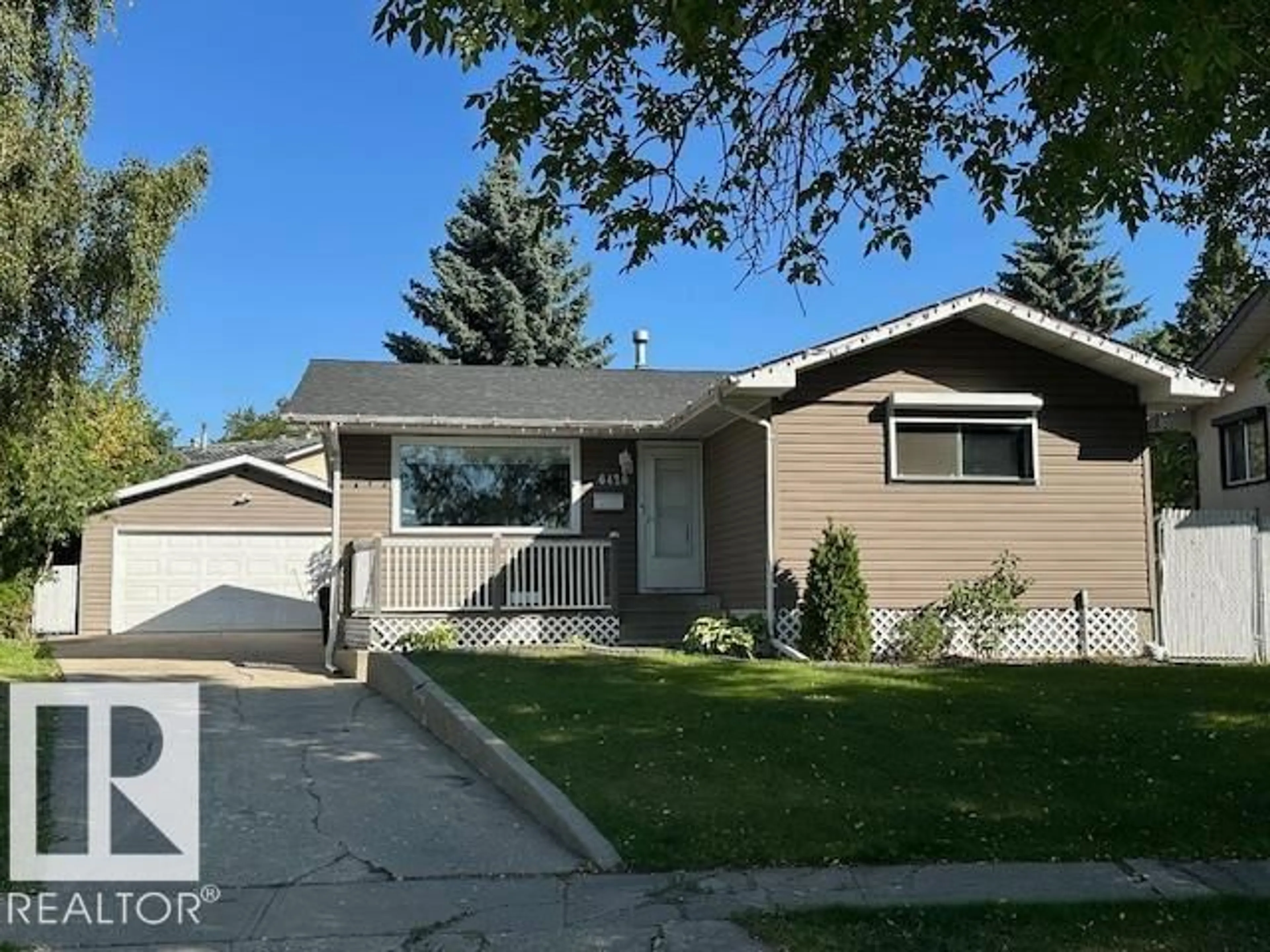 Home with vinyl exterior material, street for 6420 146 AV, Edmonton Alberta T5A1T3