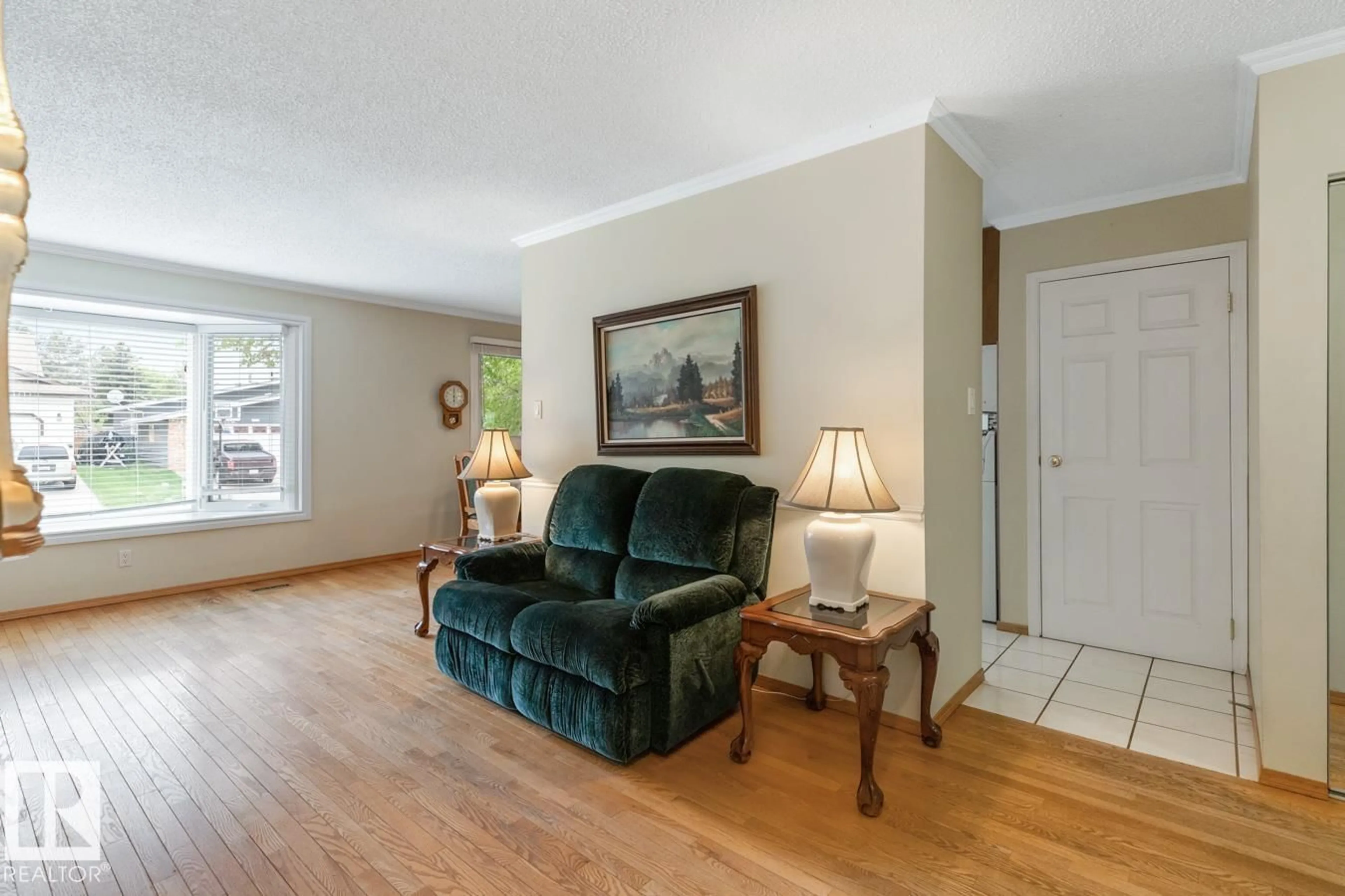 Living room with furniture, unknown for 5116 14 AV, Edmonton Alberta T6L1Z8
