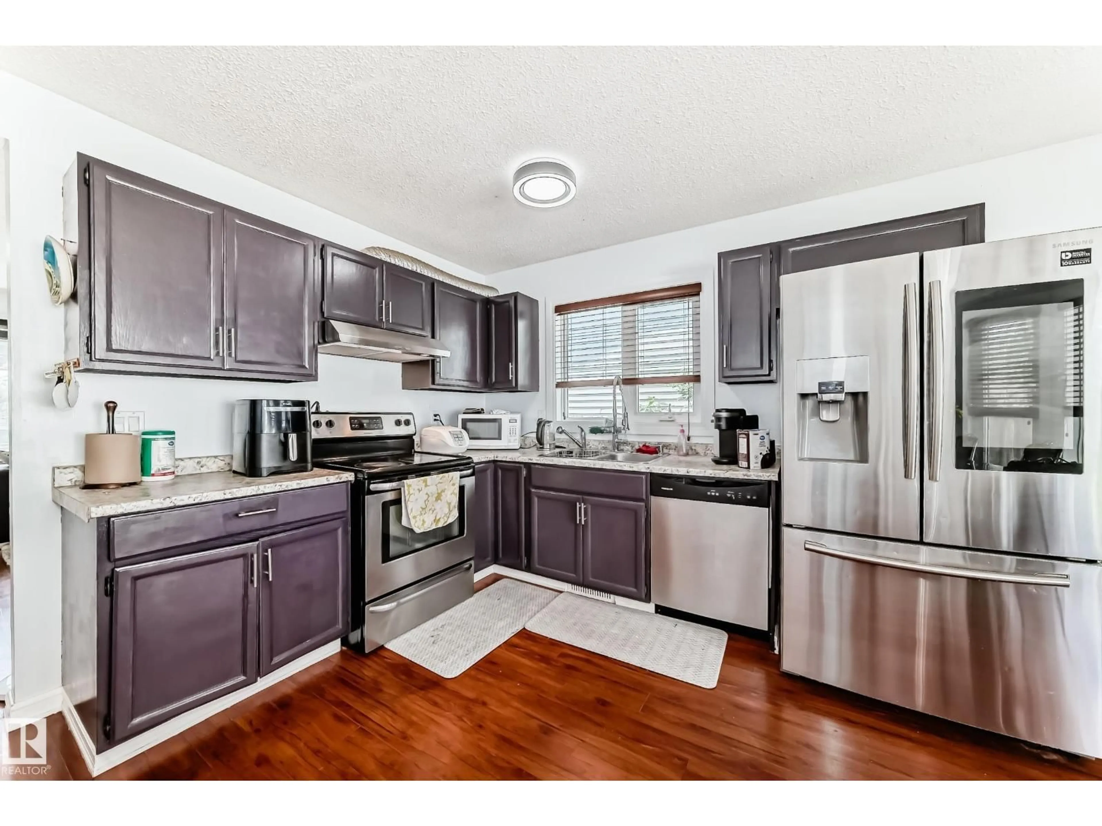 Open concept kitchen, unknown for NW - 7612 189 ST, Edmonton Alberta T5T5H9