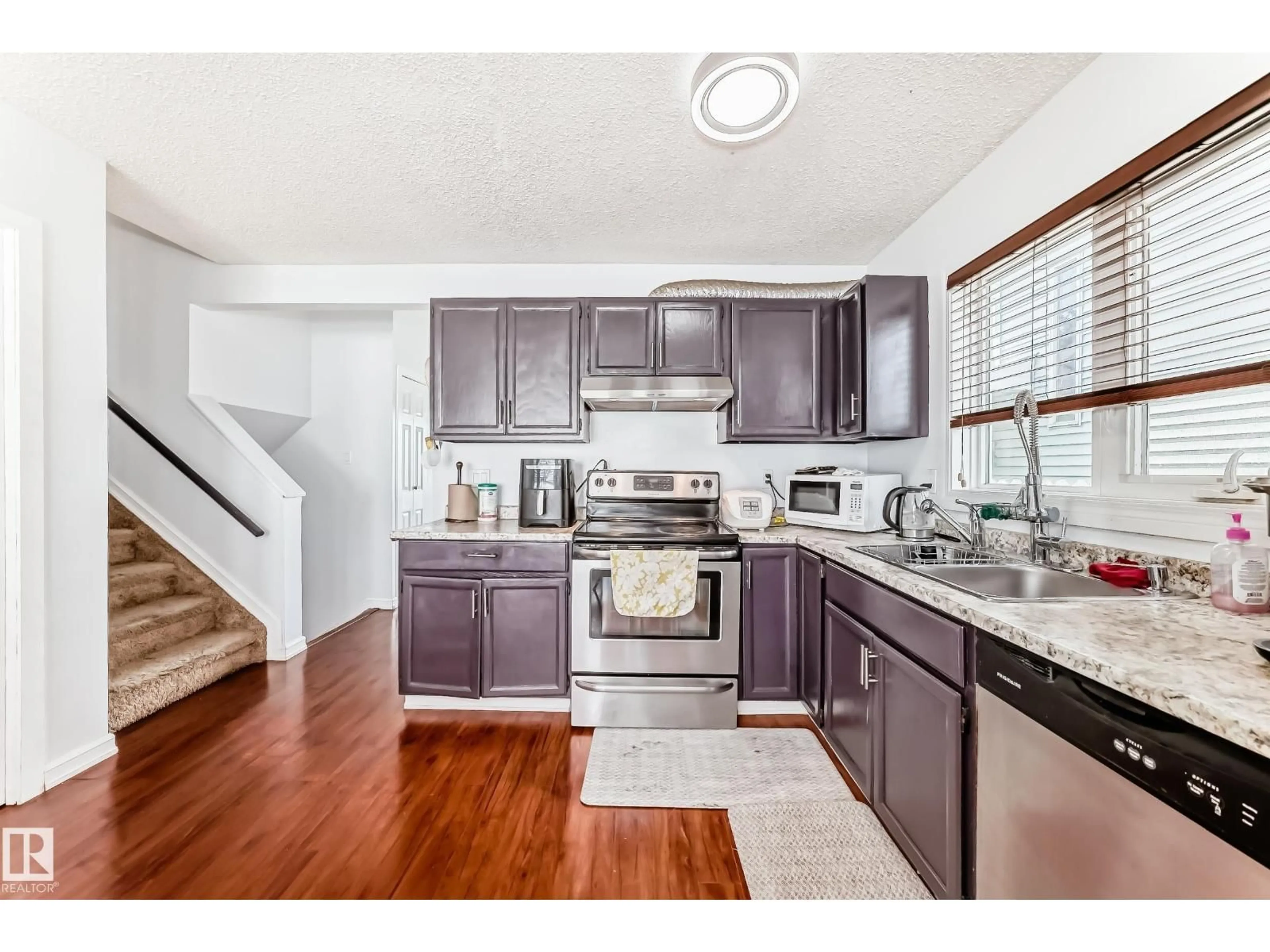 Open concept kitchen, unknown for NW - 7612 189 ST, Edmonton Alberta T5T5H9