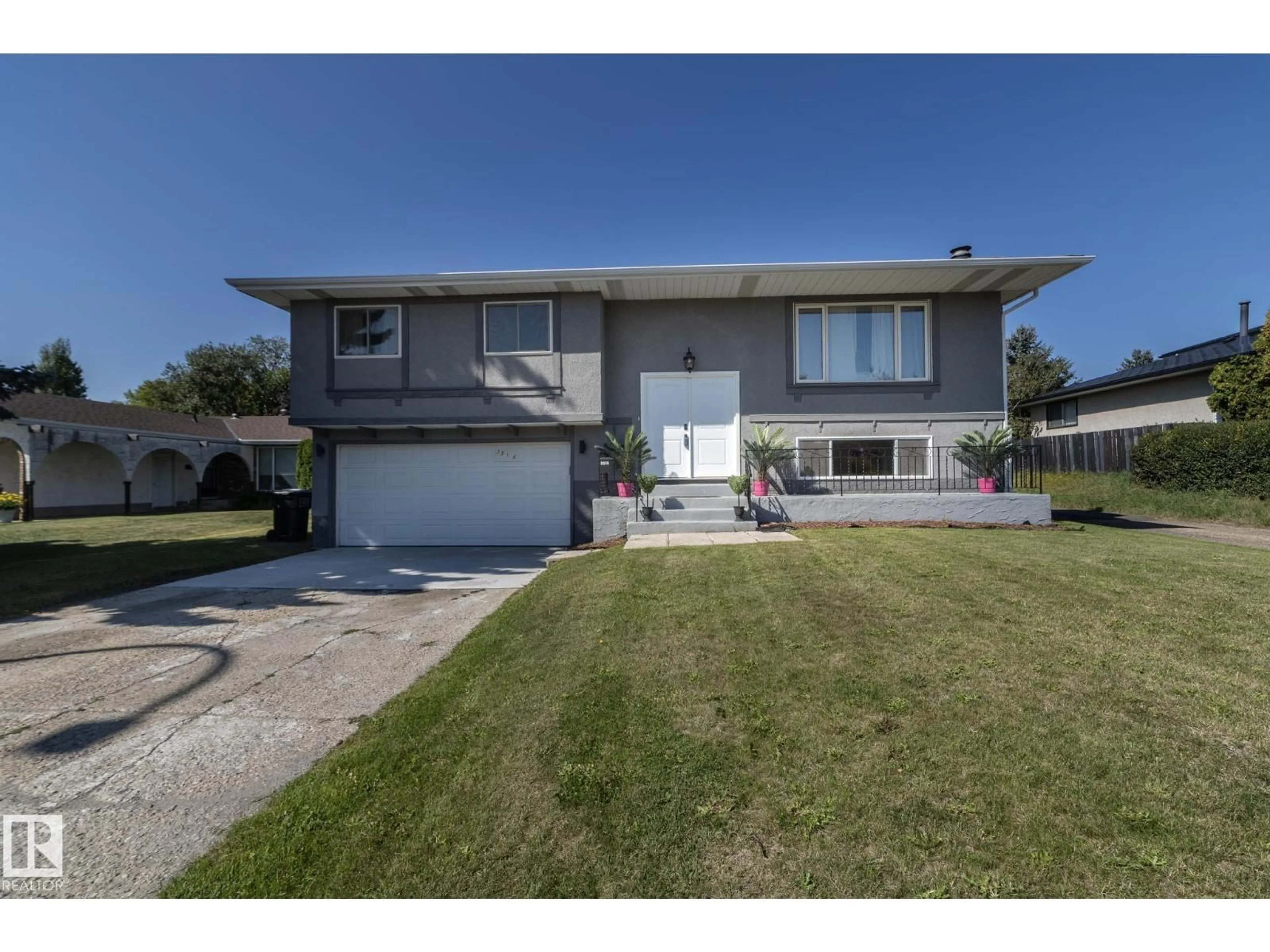 Home with vinyl exterior material, street for NW - 3516 107 ST, Edmonton Alberta T6J1B1