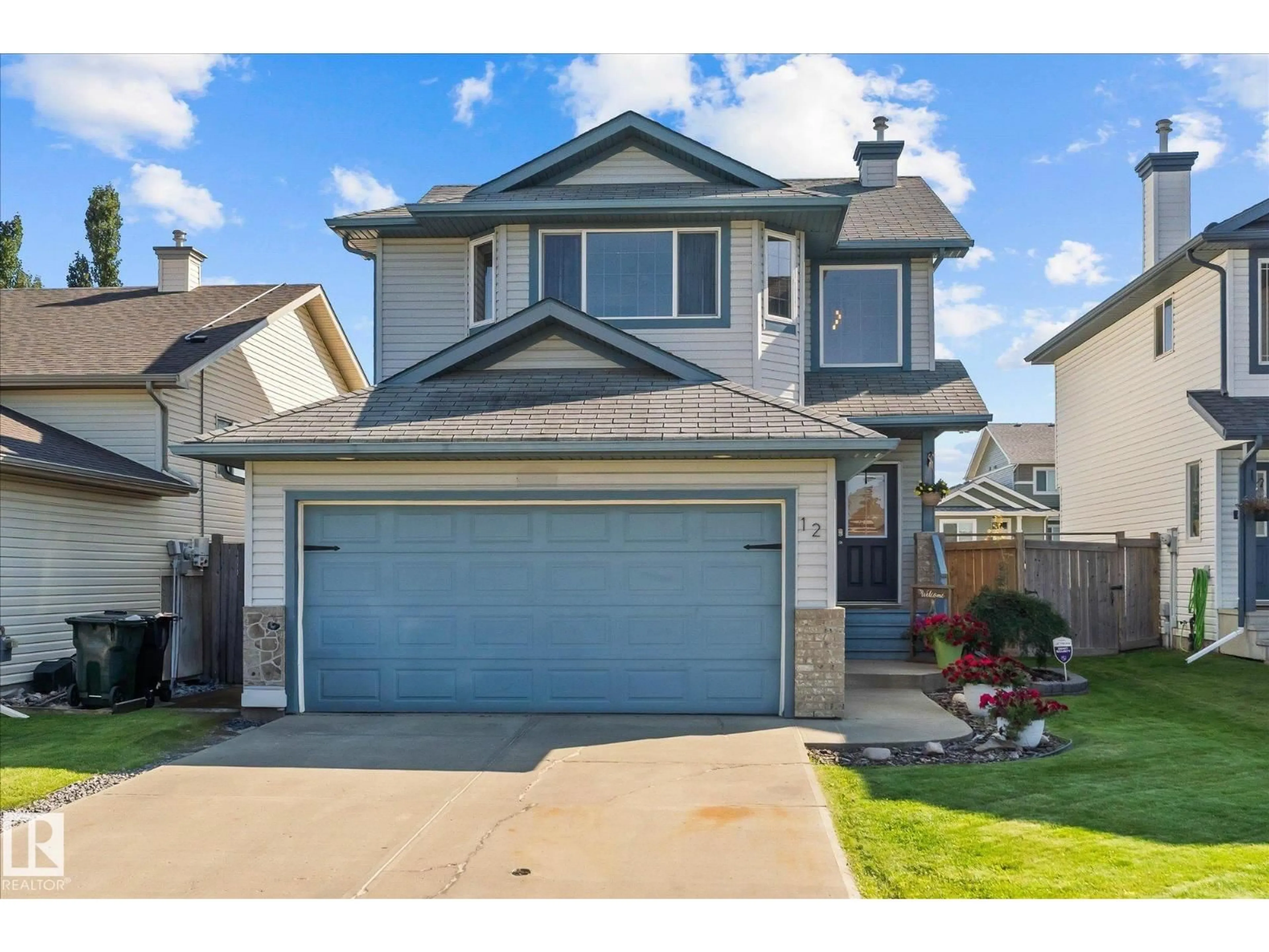 Home with vinyl exterior material, street for 12 LEYLAND WY, Spruce Grove Alberta T7X0A8