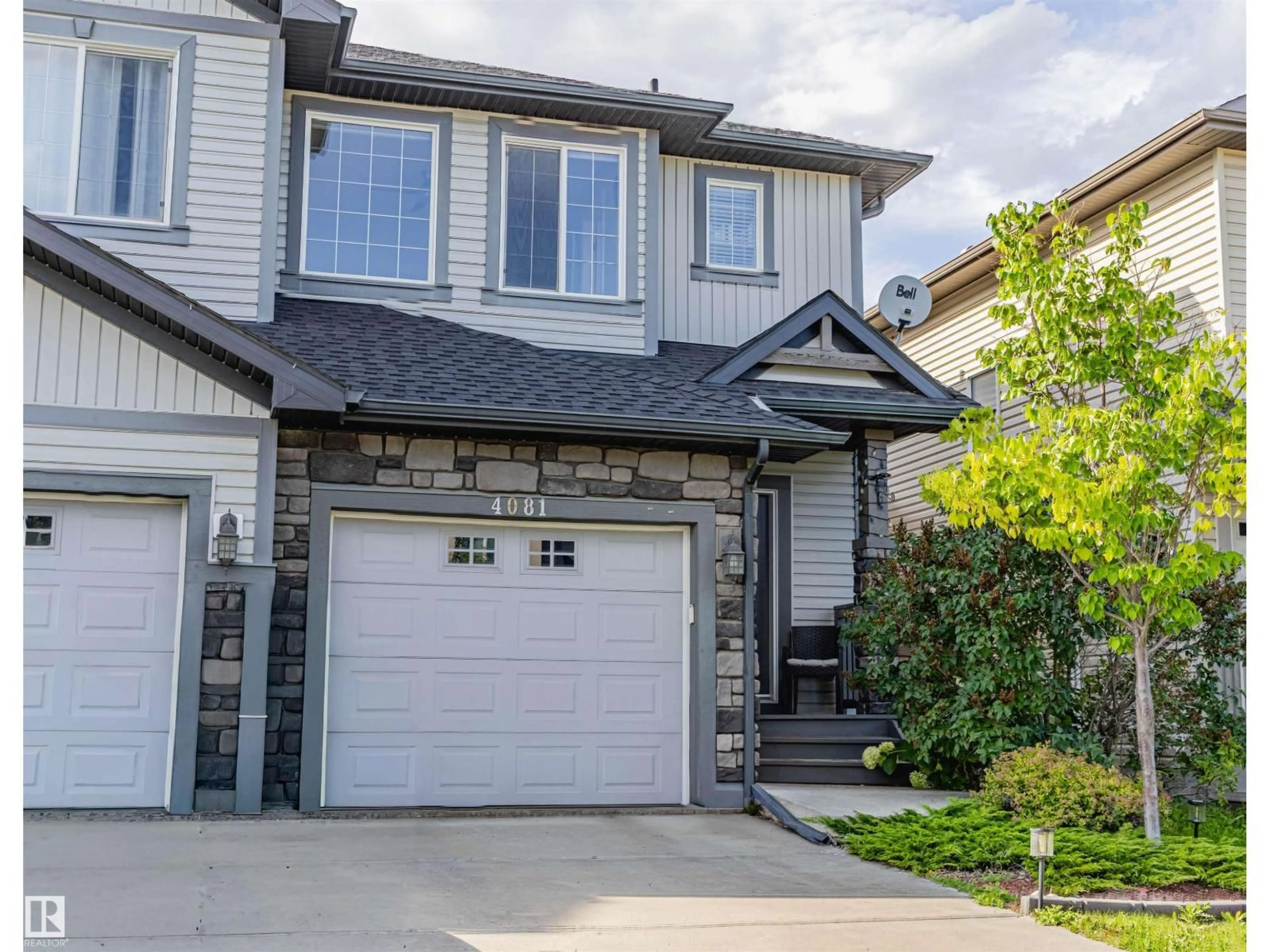 Home with vinyl exterior material, street for 4081 ALEXANDER WY, Edmonton Alberta T6W2C6