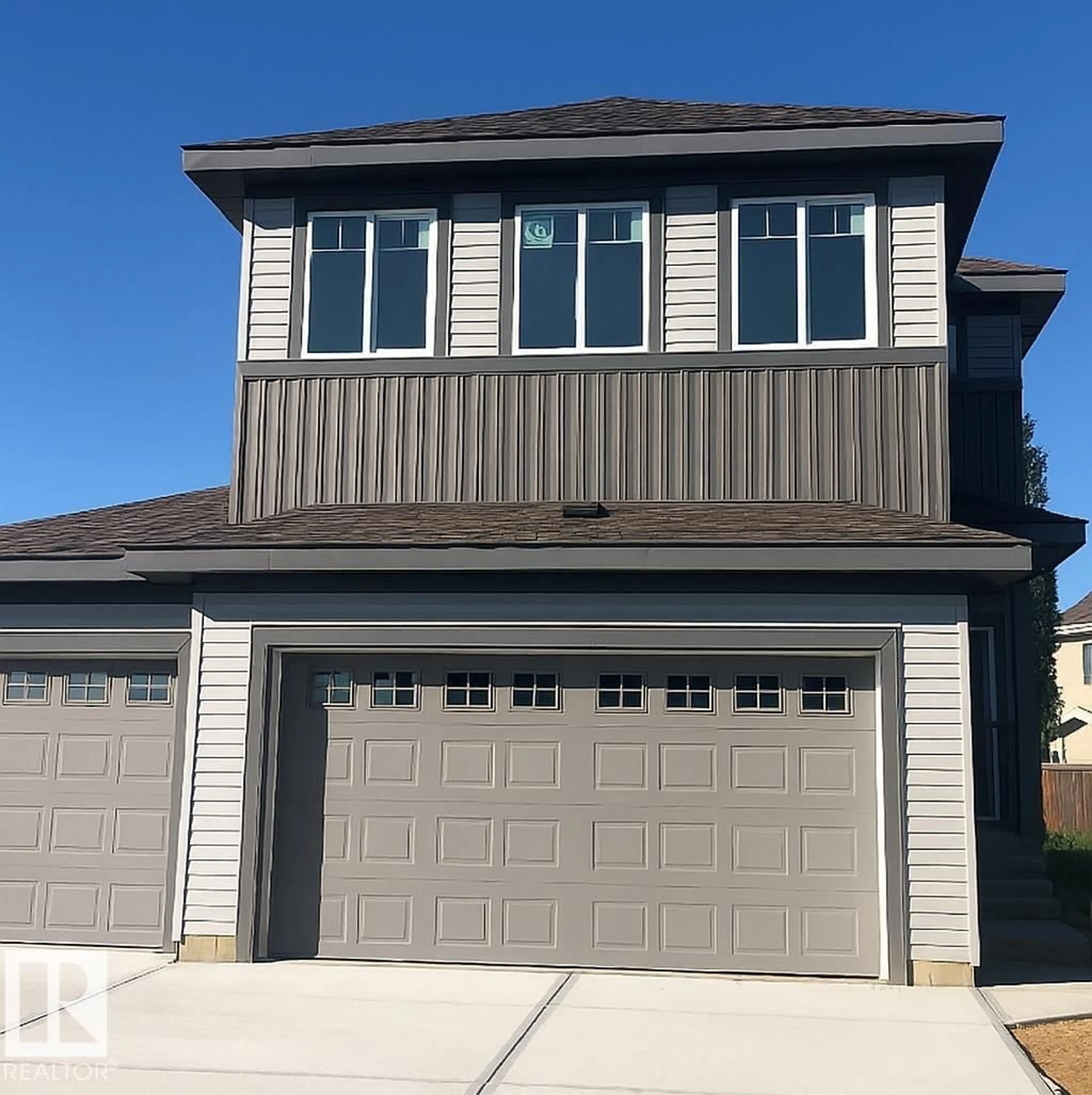 Home with vinyl exterior material, street for 1918 WESTERRA LN, Stony Plain Alberta T7Z0L3